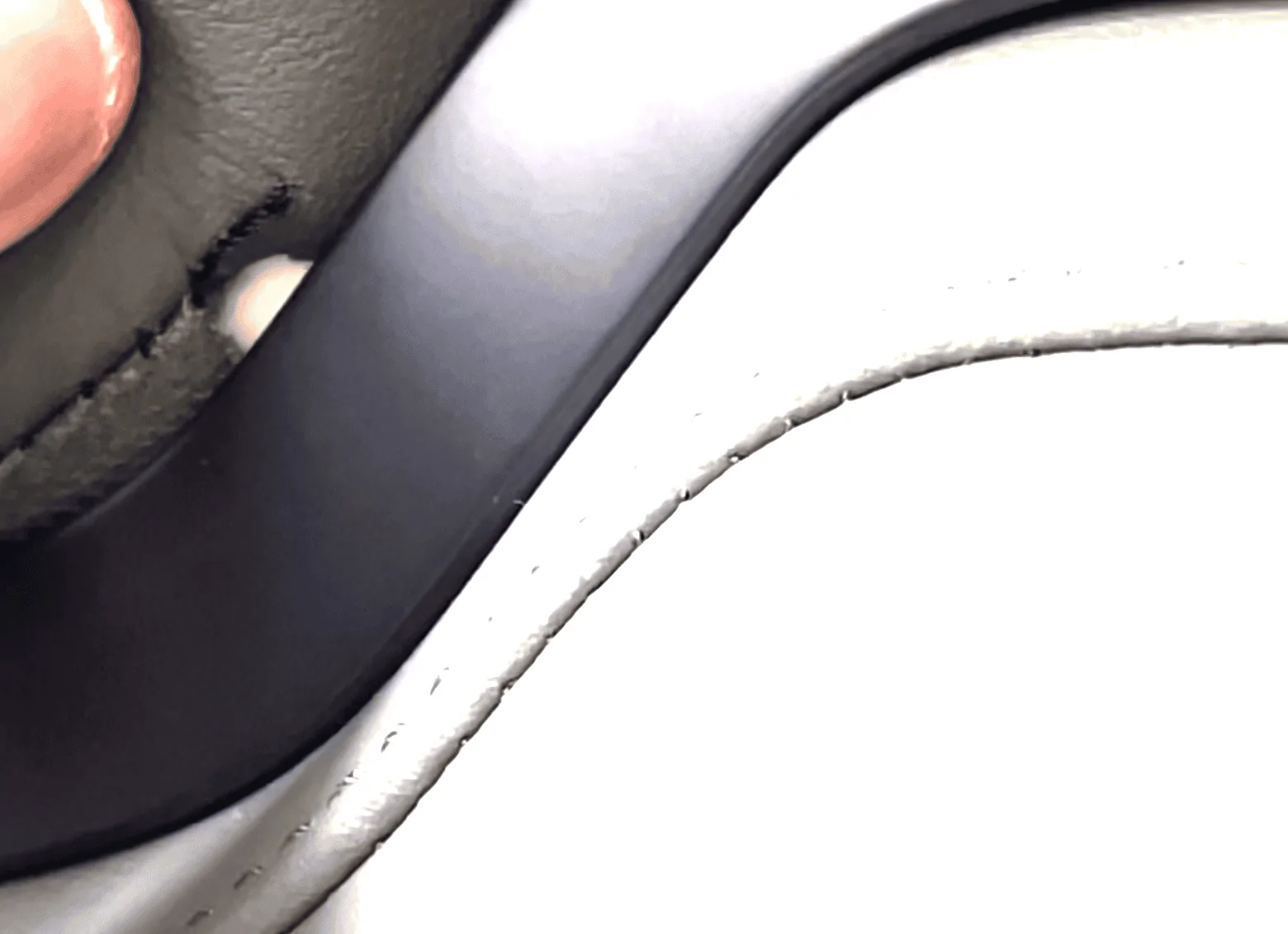 Rivian R1T R1S Driver's seat vinyl pulling out from divider, anybody else? Screen Shot 2022-09-16 at 10.45.05 PM