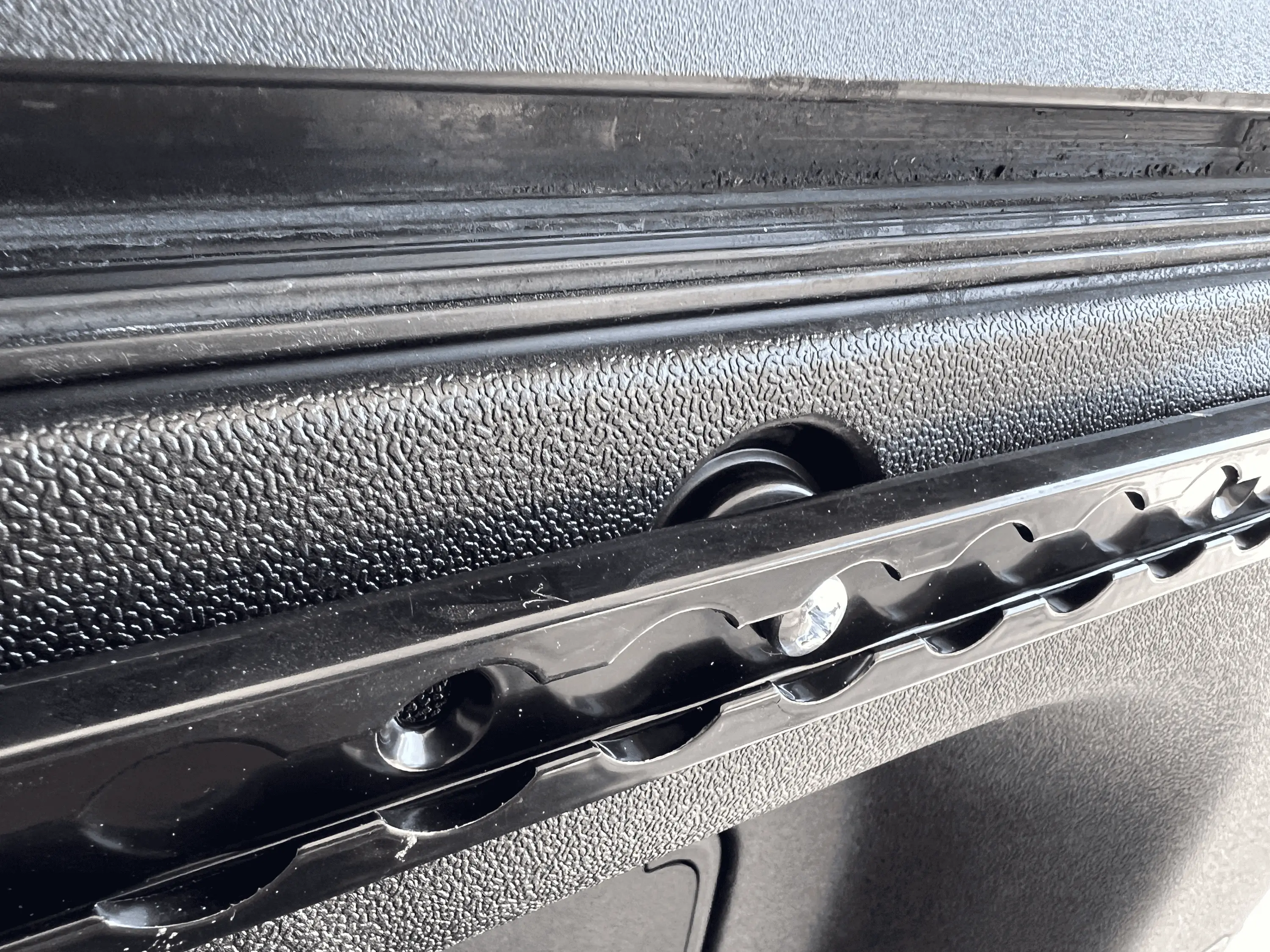 Rivian R1T R1S Installed S Track Tie Down Rails to Rivian R1T Bed tempImageAWiMzR