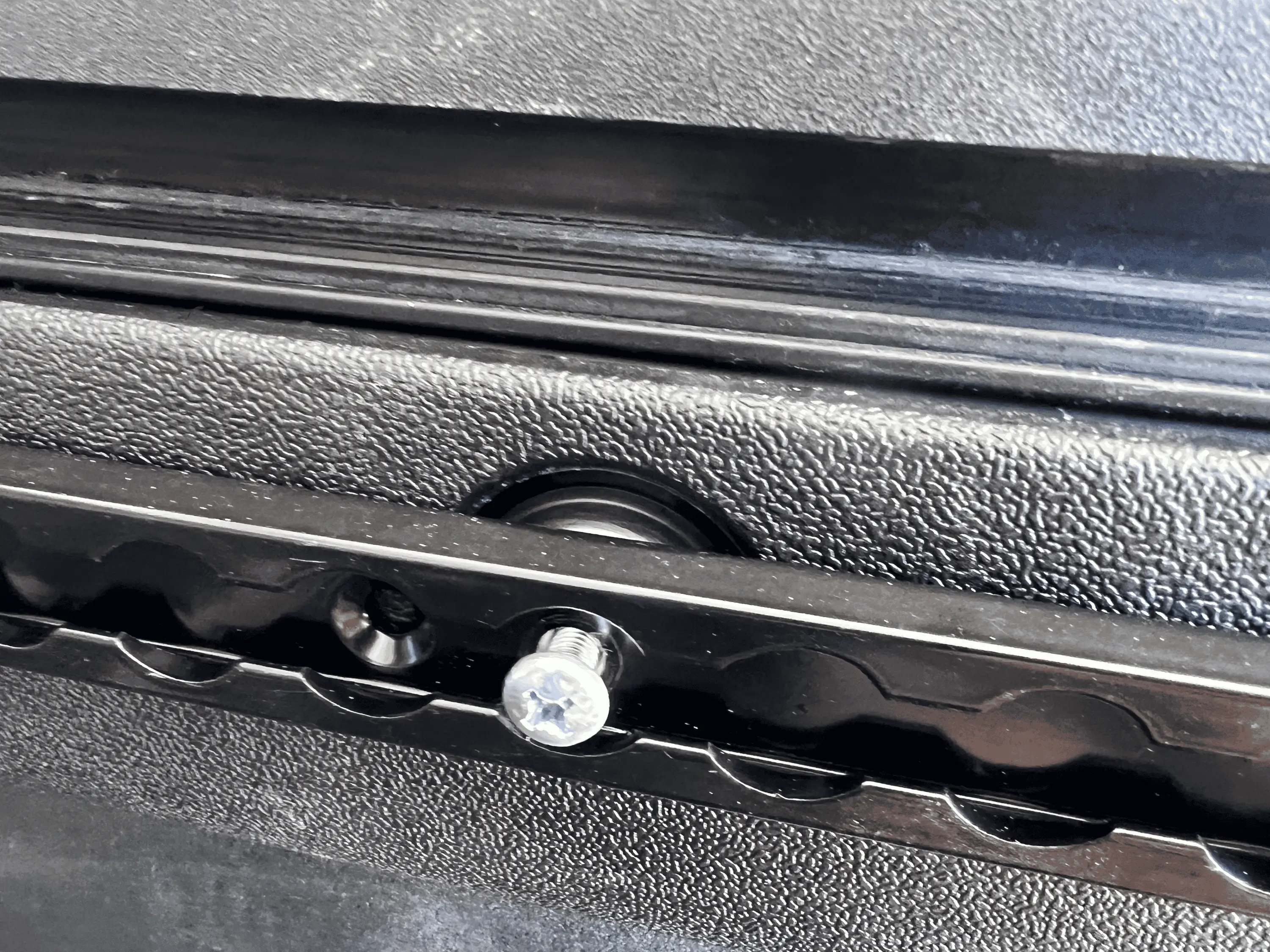 Rivian R1T R1S Installed S Track Tie Down Rails to Rivian R1T Bed tempImageA6mfyc