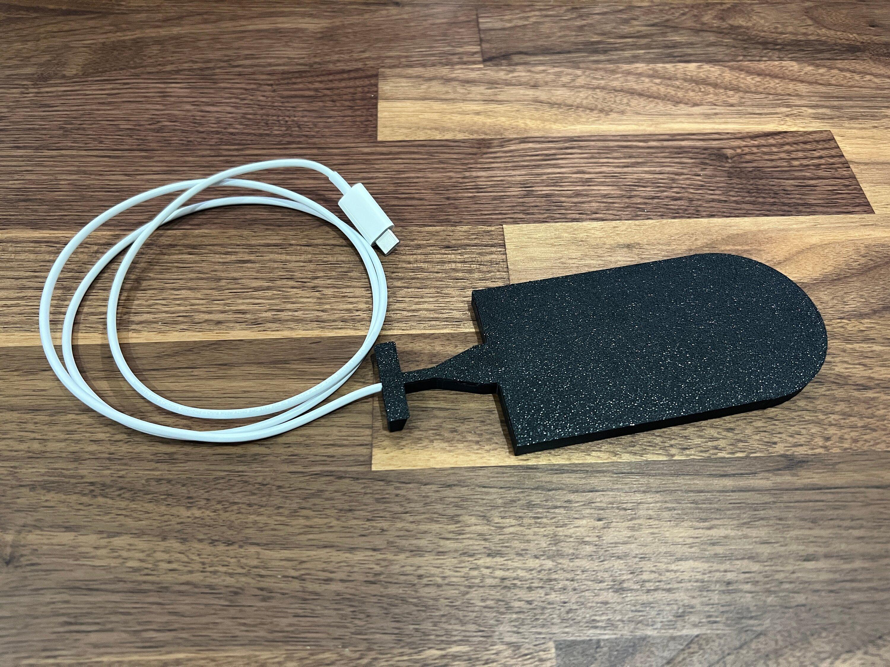 Rivian R1T R1S iPhone 14 Pro is not compatible with the Rivian Charge Pad IMG_0869.JPG