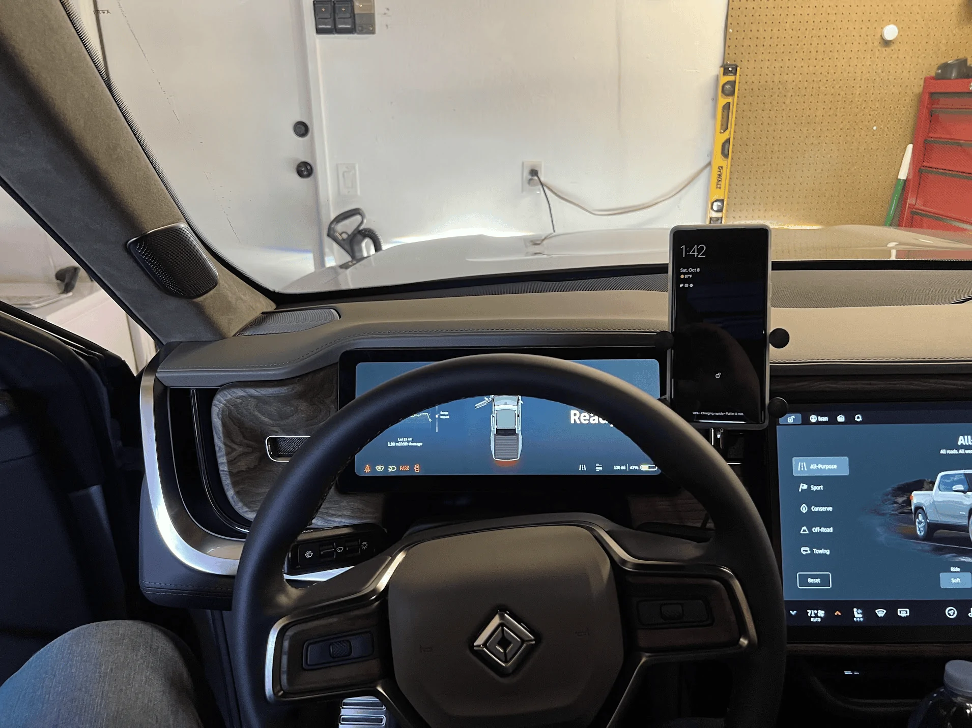 Rivian R1T R1S Mounting a cell phone.  Has anyone done it? 1665263902886