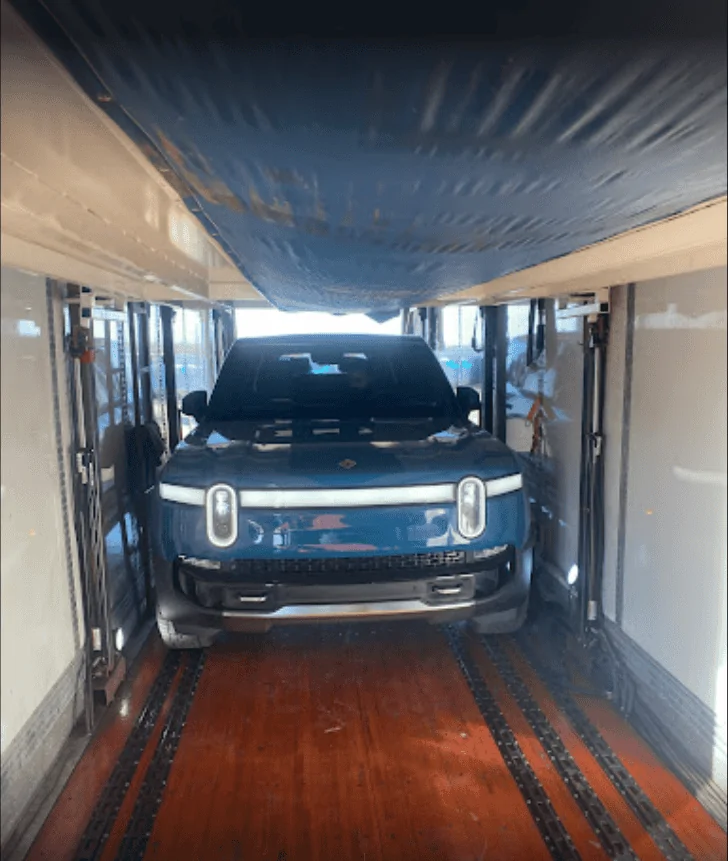 Rivian R1T R1S Rivians Loaded onto trains in Normal 2