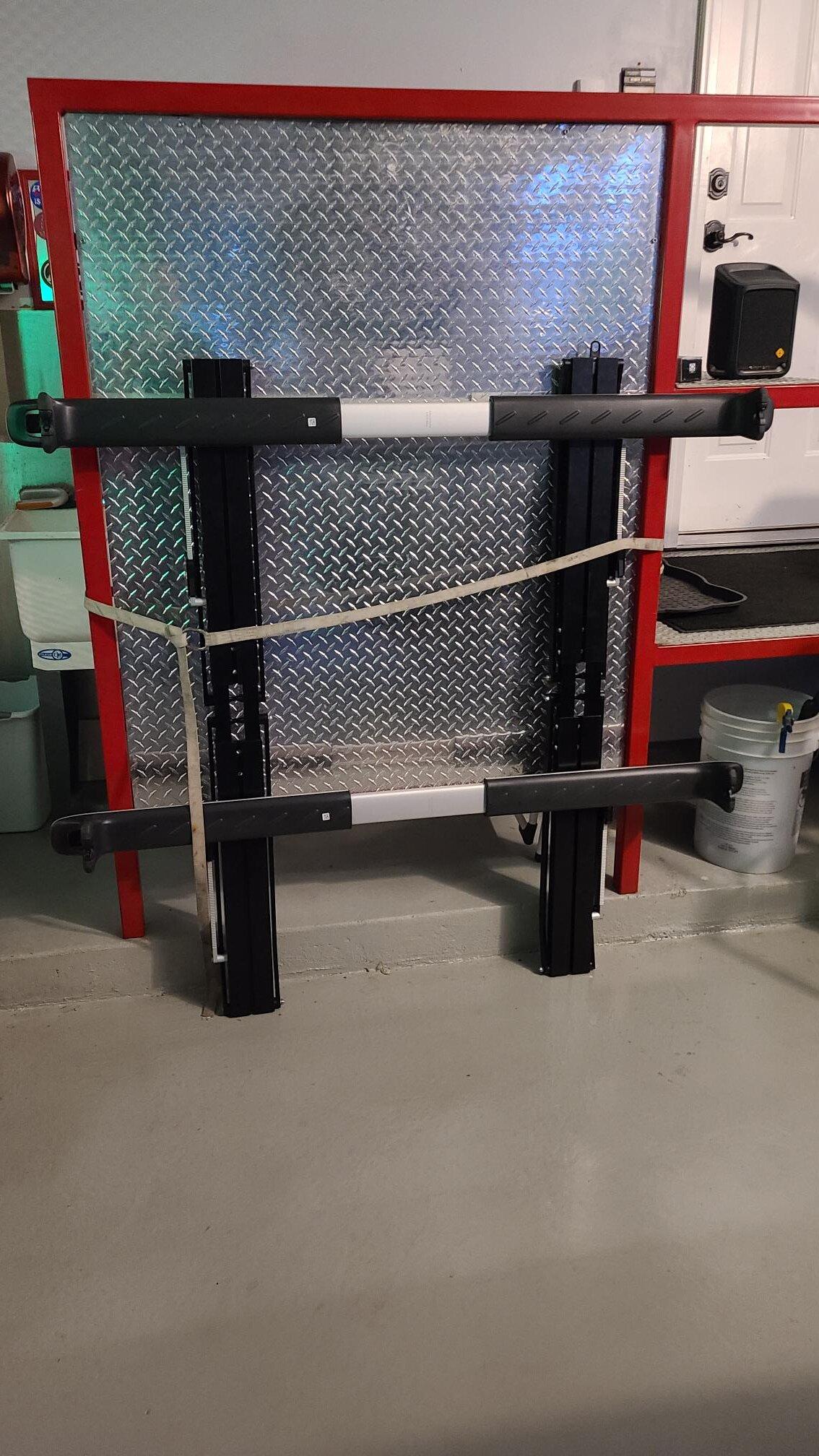 Rivian R1T R1S 1UP USA Equip-D trays mounted on R1T bed crossbars 20221012_074638