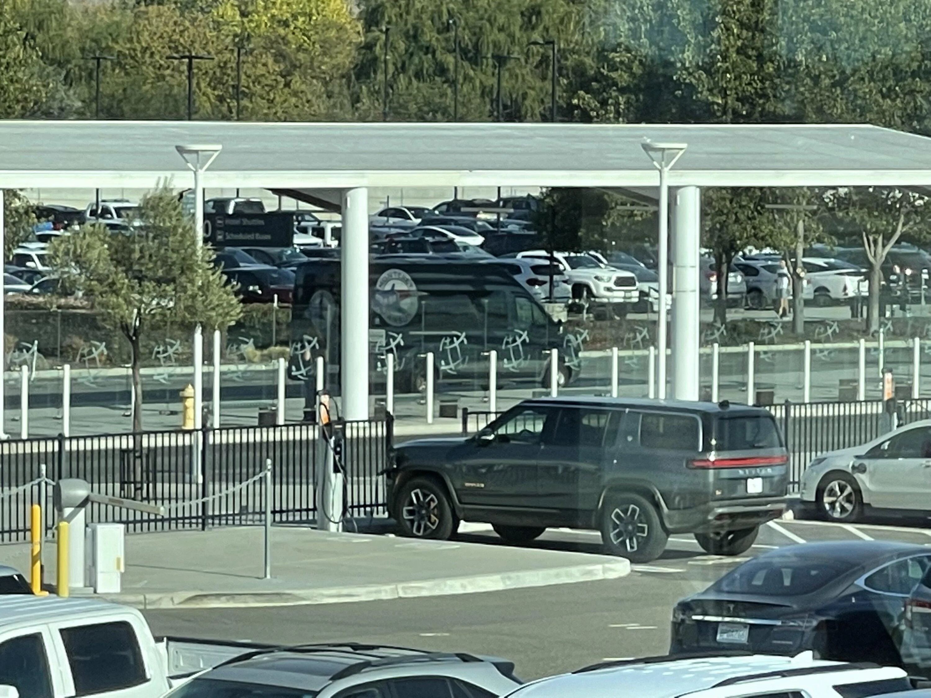 Rivian R1T R1S ICE'd by a Tesla. Or was I "BEV'd"? 57673949-8DA7-4FF7-8FF2-9C6C469C4AFF