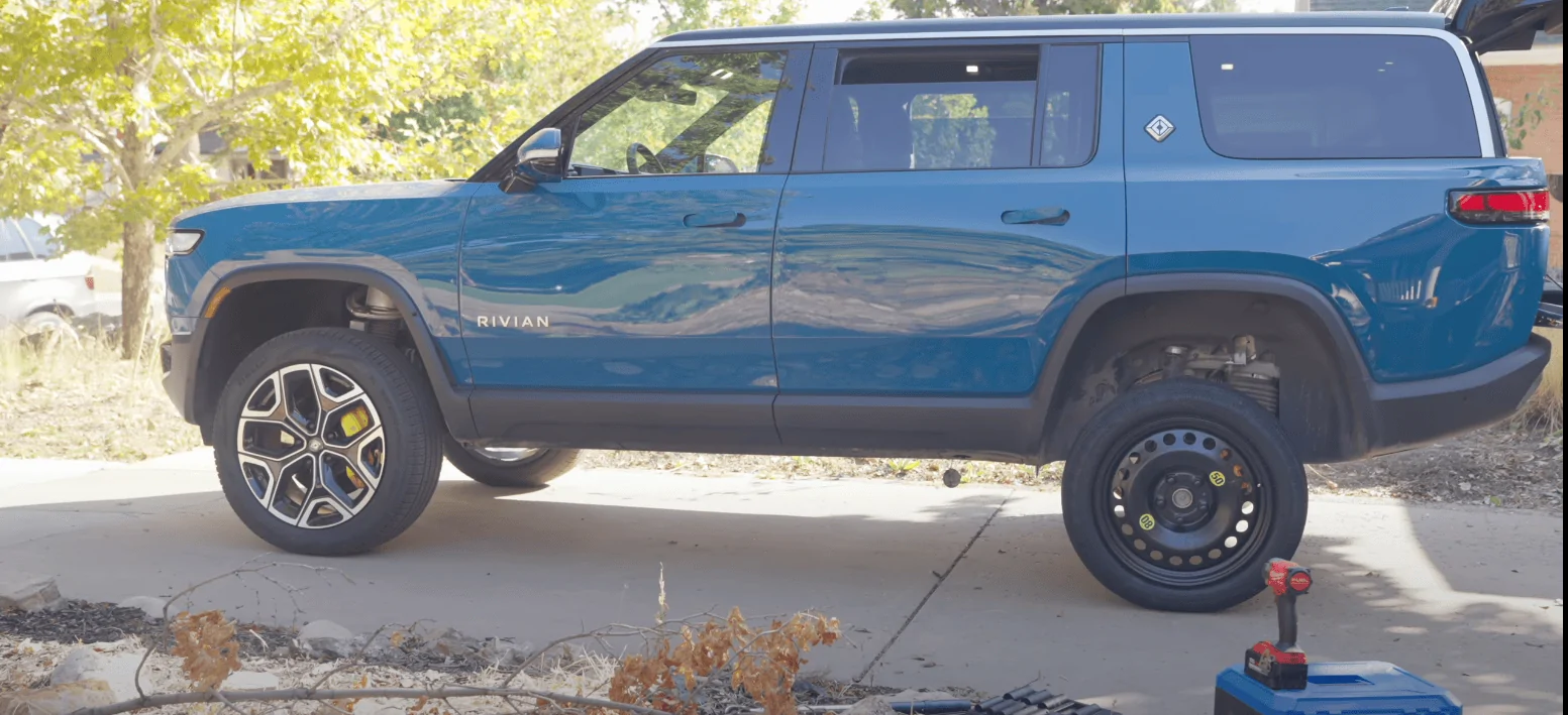 Rivian R1T R1S Rivian compact spare inflated & installed in glowing R1S review video [by Snazzy Labs] 1666367699828