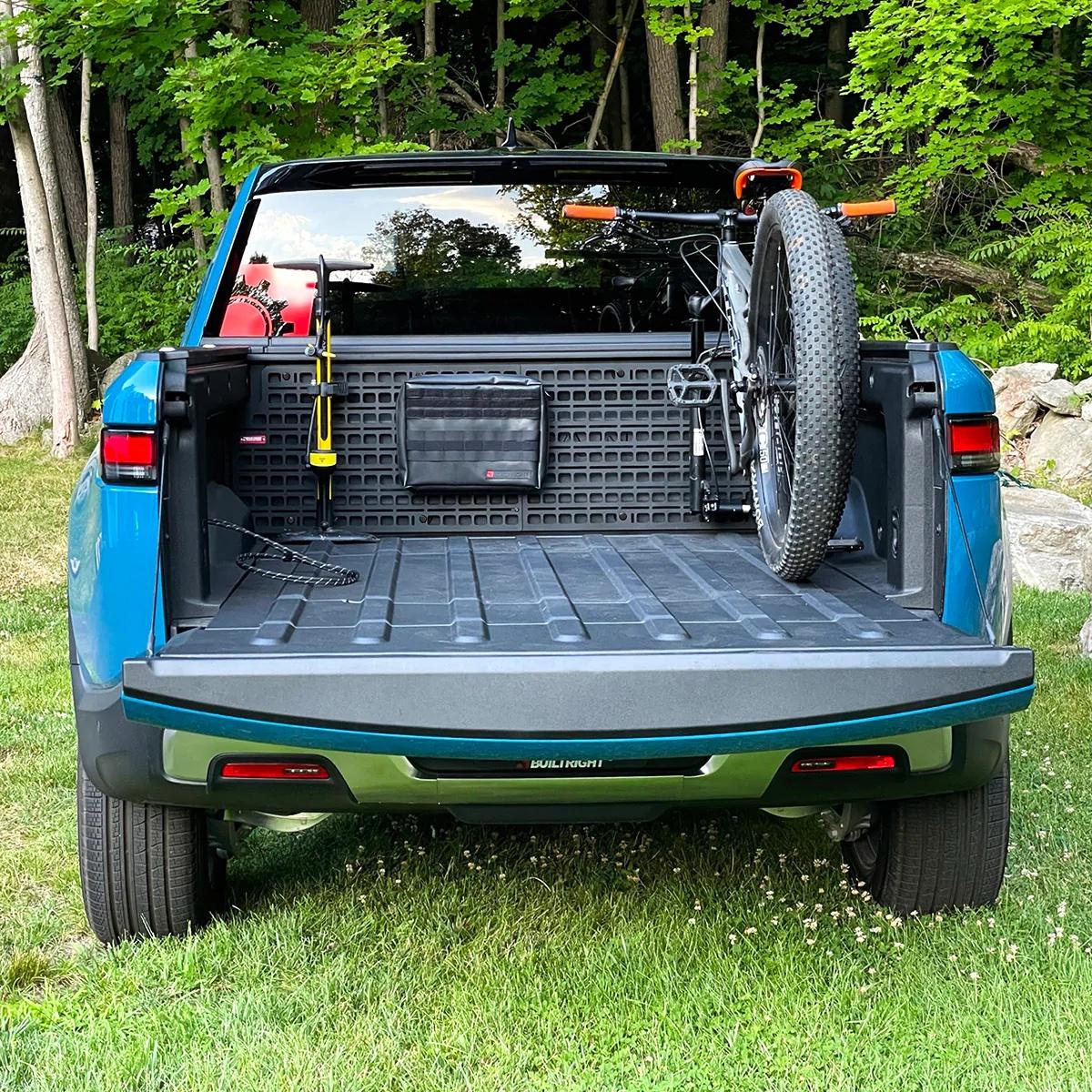 Rivian R1T R1S Get your bed gear ready! We've got BuiltRight R1T bed panel kits in stock for you now 102701_Rivian_R1T_MOLLE_8_1200_1800x1800.progressive (1)