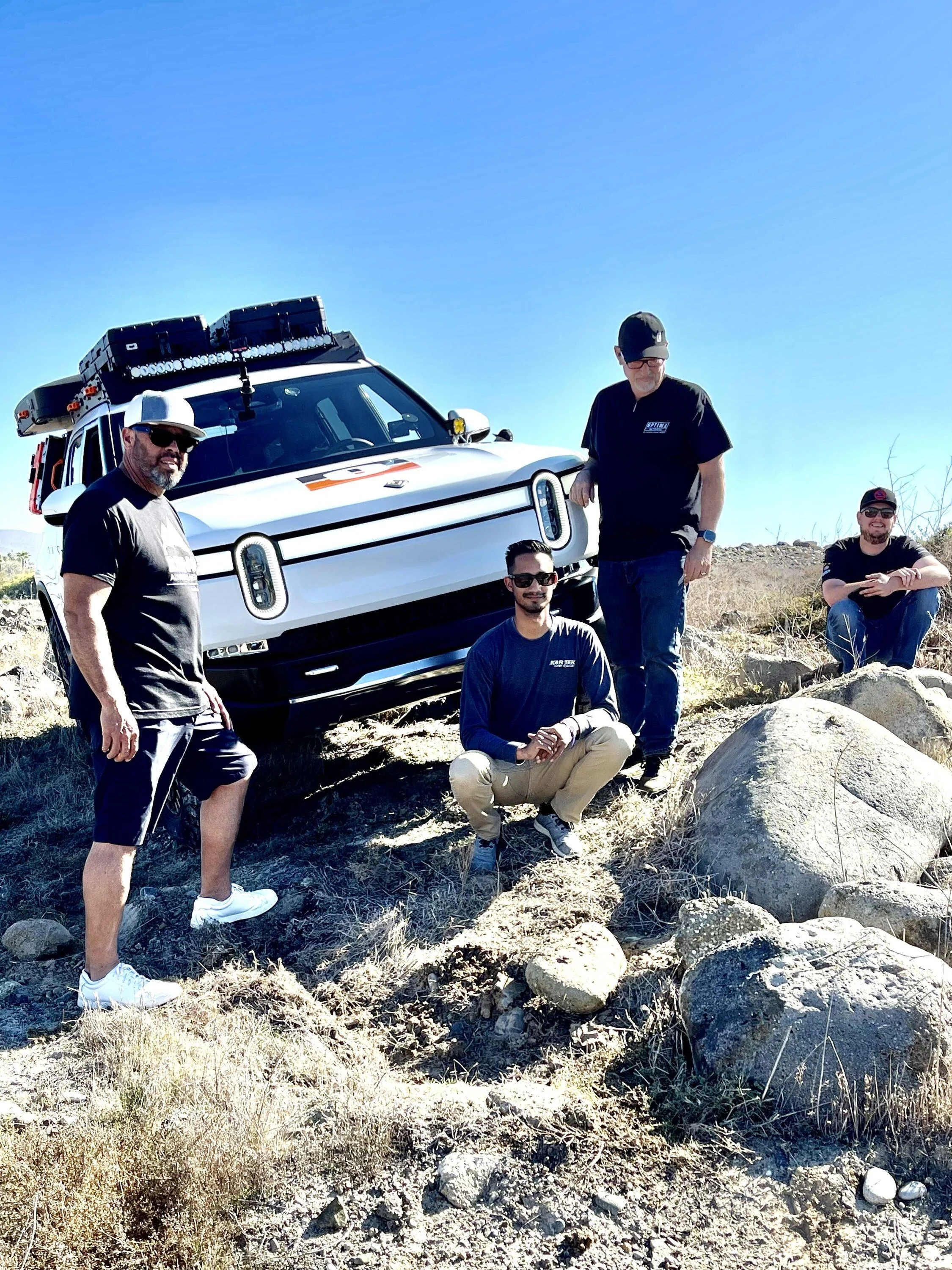 Rivian R1T R1S Update - Baja Testing for OPTIMA Rivian R1T and DCE Rock Sliders group shot baja