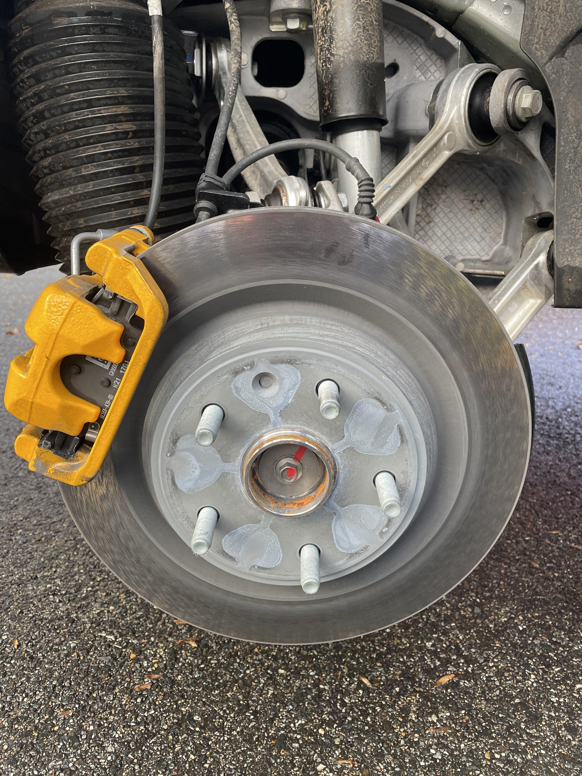 Rivian R1T R1S 21" Road Tire and Brake Wear after 10K Miles -- tread / brake pad remaining measurements IMG_4155.JPG