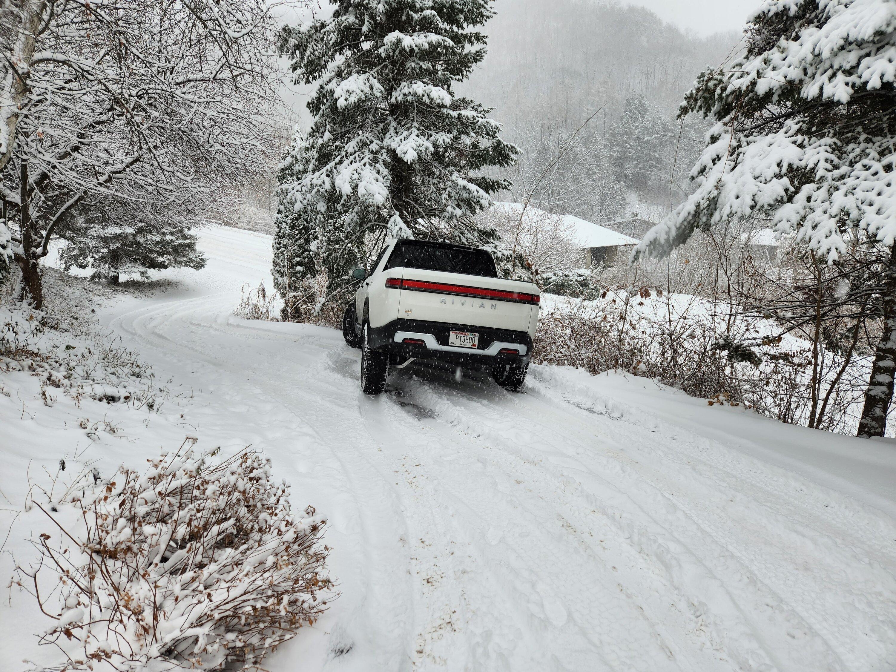 Rivian R1T R1S Guess I need some snow tires... my R1T hood now has a nice dent (on factory 20" A/T) 20221209_085018