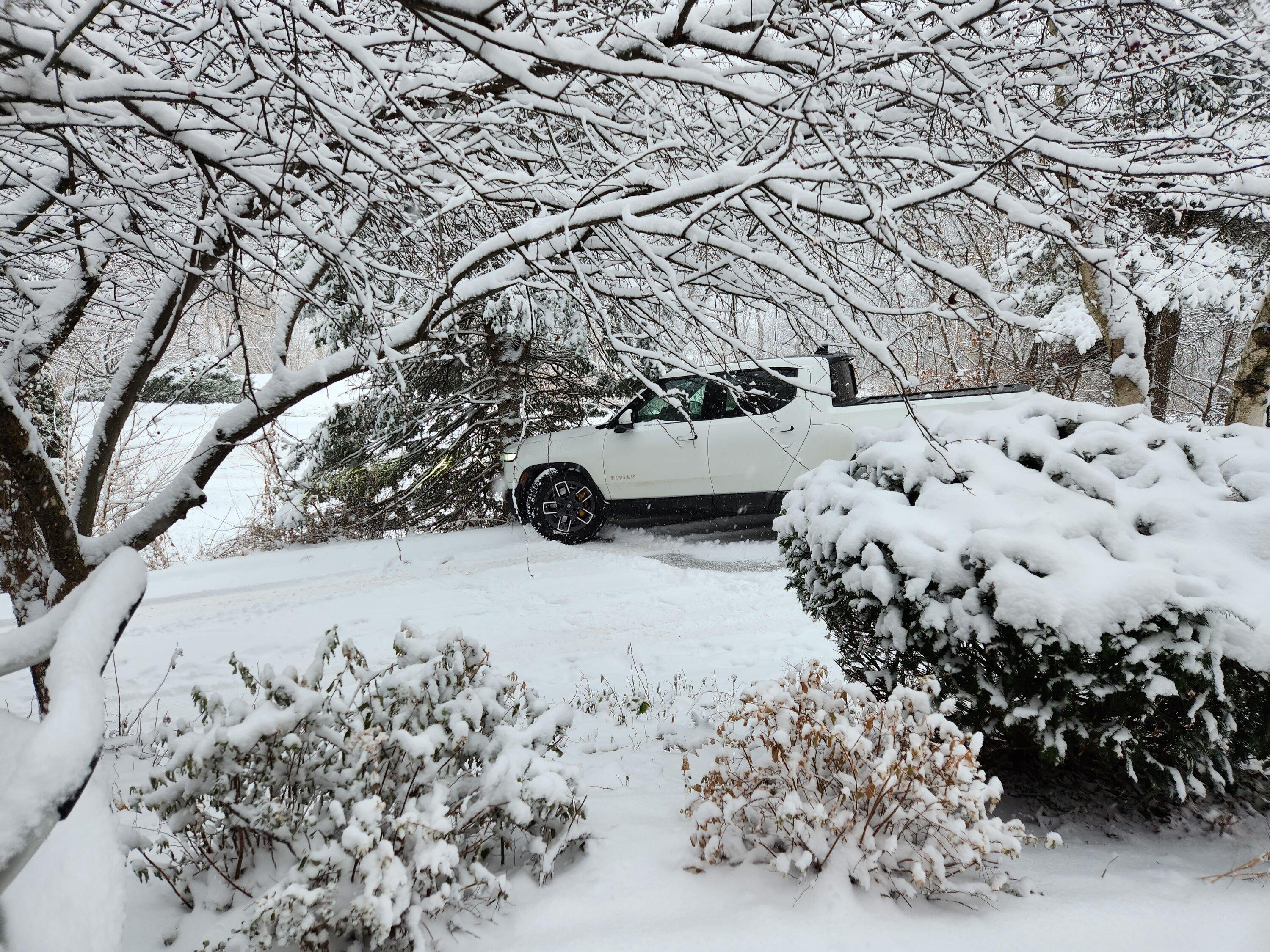 Rivian R1T R1S Guess I need some snow tires... my R1T hood now has a nice dent (on factory 20" A/T) 20221209_084856