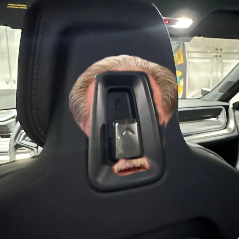 Rivian R1T R1S R1S Forest Edge delivered with wood headrest surround removed. 01C6D332-BB47-4016-9ABA-E347C6E9CE51