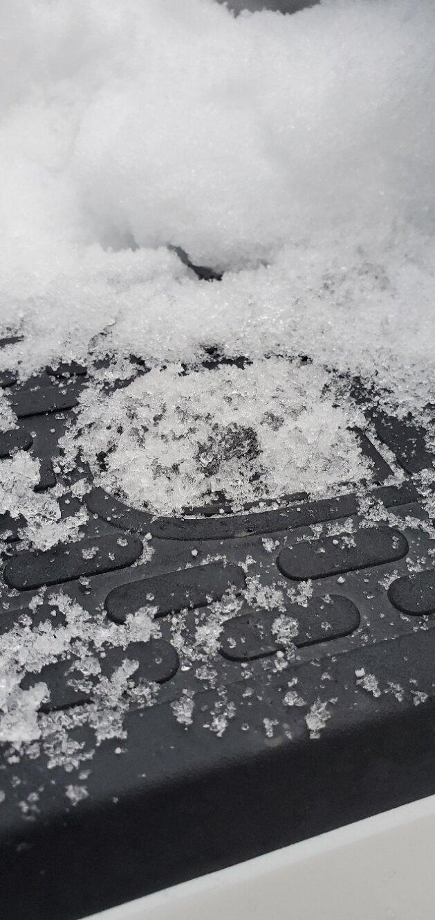 Rivian R1T R1S Experienced Winter Ice Buildup Issues gear tunnel button
