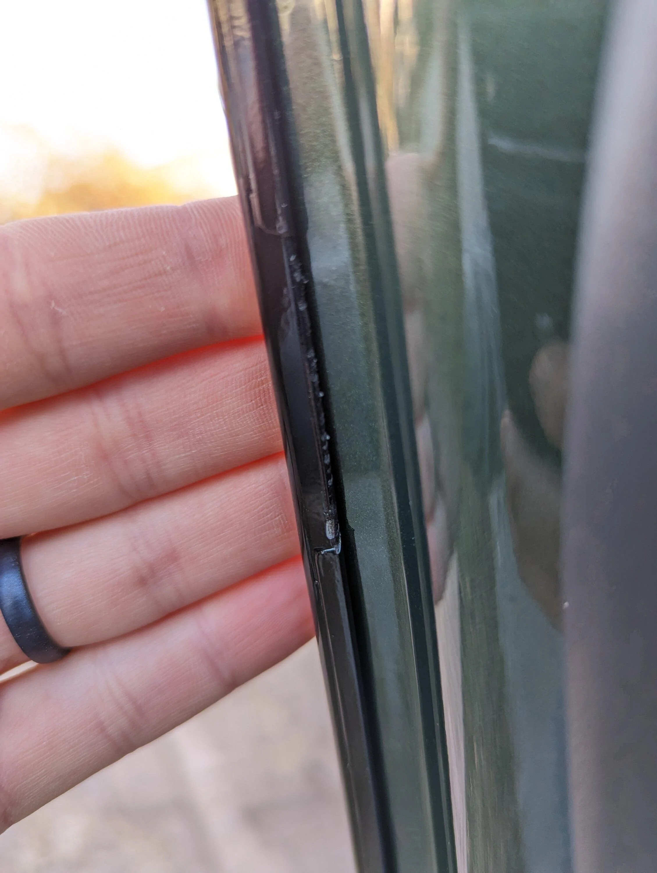 Rivian R1T R1S Front door edge paint gouges PXL_20221220_190747819