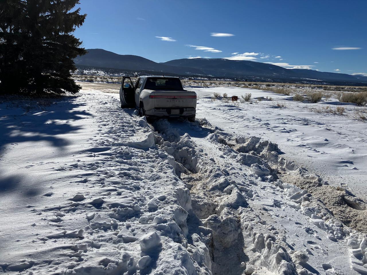 Rivian R1T R1S Frozen Spare Tire Latch stuck in snow - 1