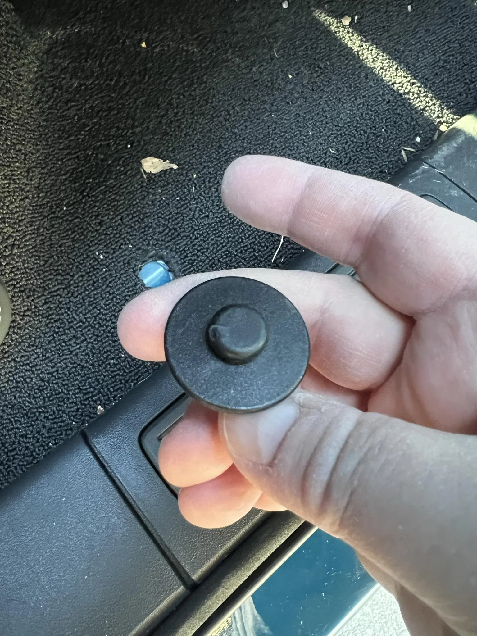 Rivian R1T R1S Broken floor mat retainer IMG_7601