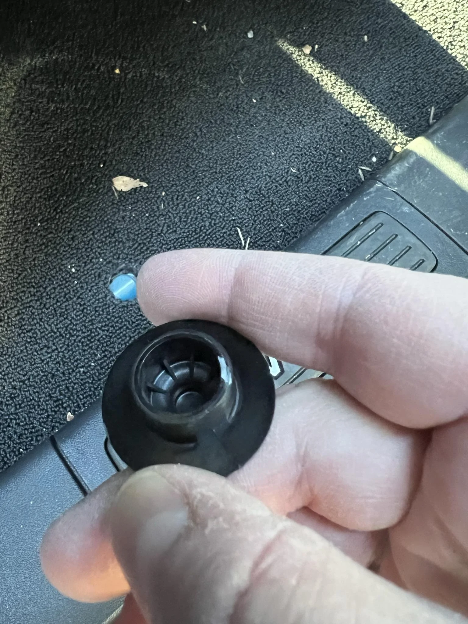 Rivian R1T R1S Broken floor mat retainer IMG_7602