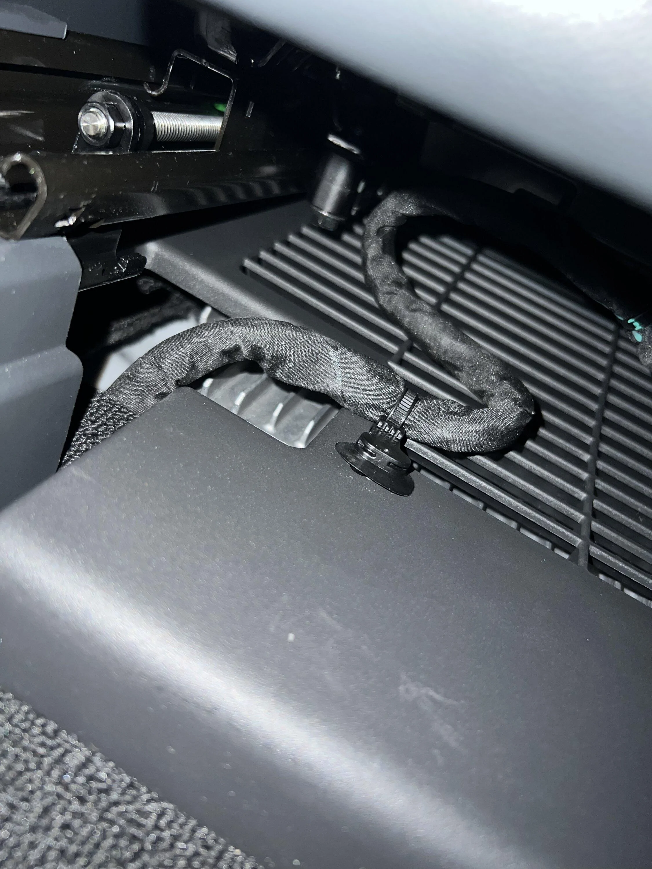 Rivian R1T R1S Small lighter lost under seat 132458B1-267D-424B-A413-EE6D9F1CAE72