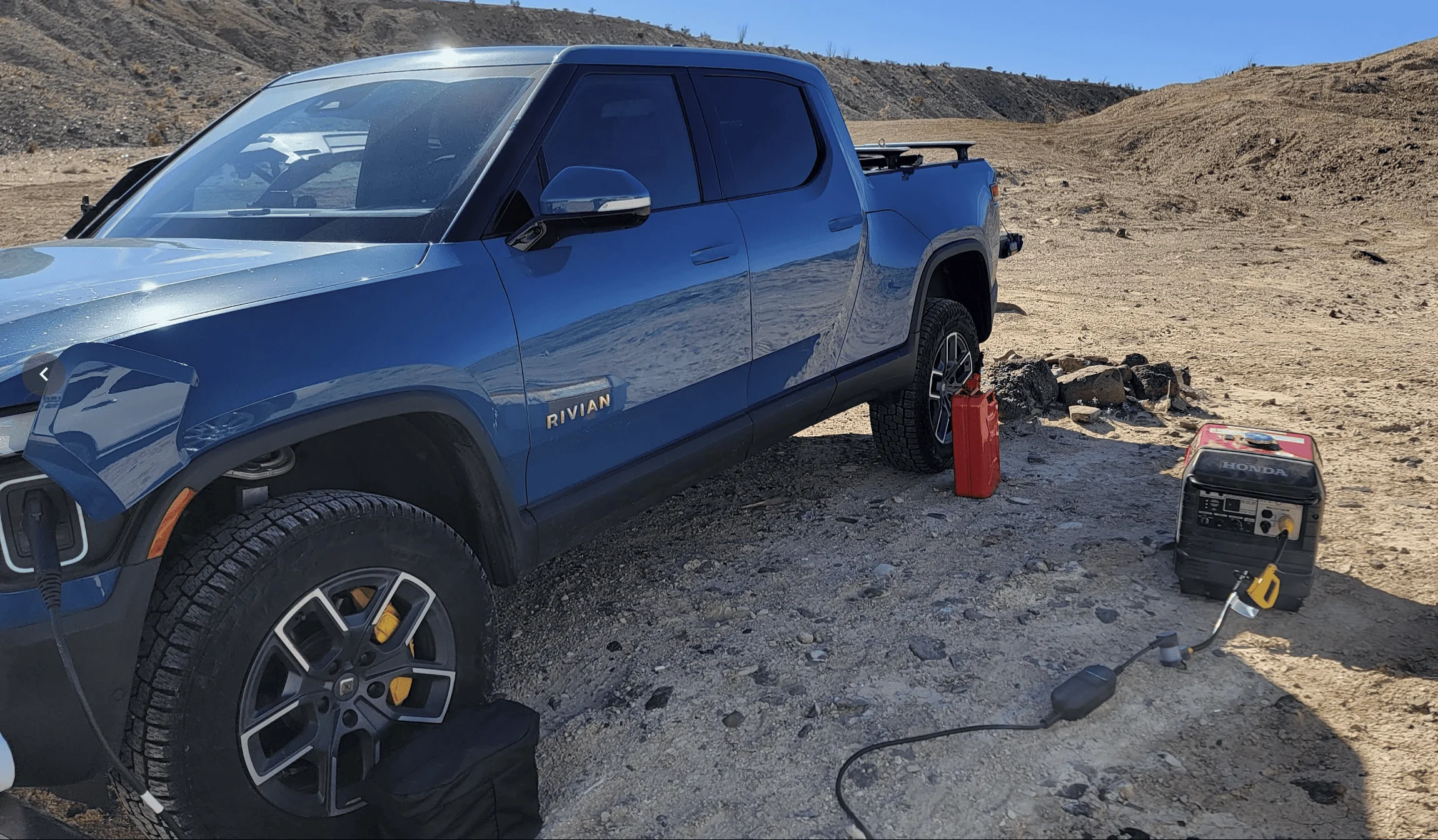 Rivian R1T R1S It's a hybrid now... R1T charged at 5.2kw with portable generator and charging adapter 1673411422987