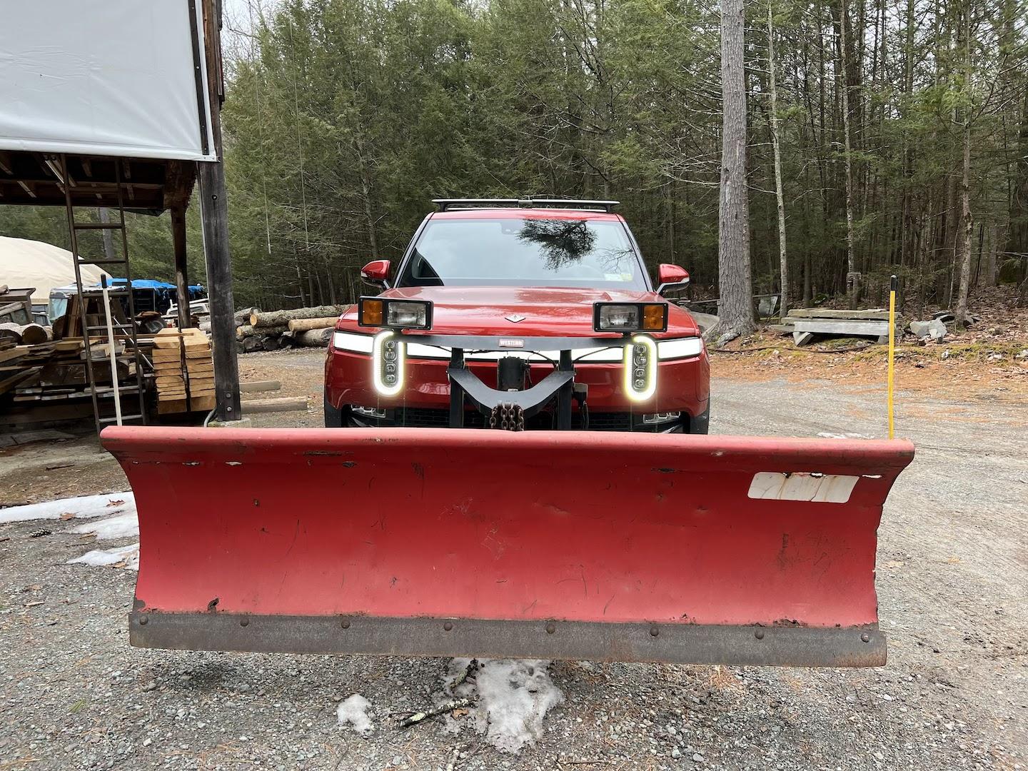 Rivian R1T R1S Anyone looking at getting a snow plow attaching to front hooks? Rivian Snow Plow