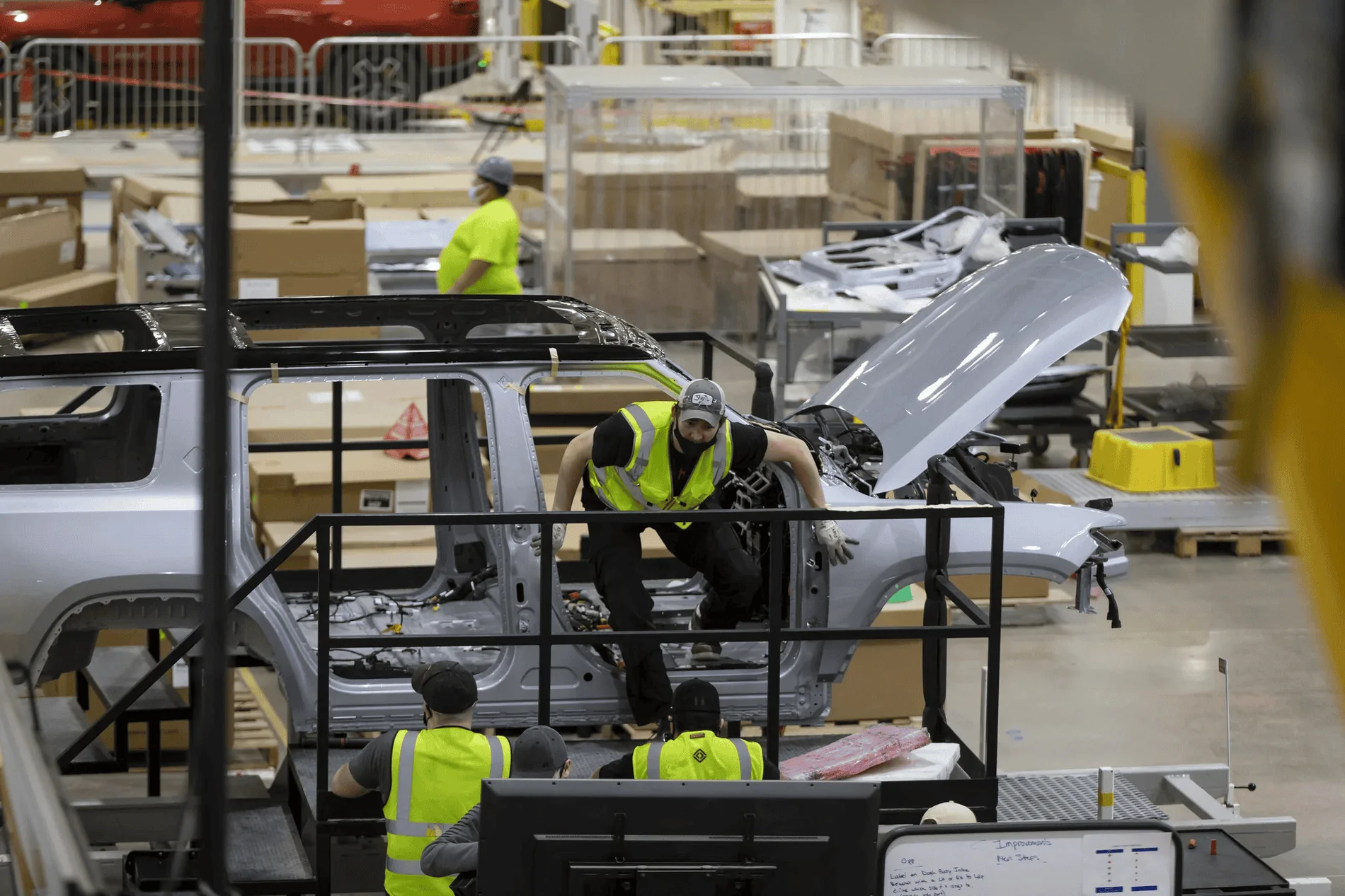 Rivian R1T R1S Chicago Tribune Article With Great Factory Updates and Photos! ezgif.com-gif-maker