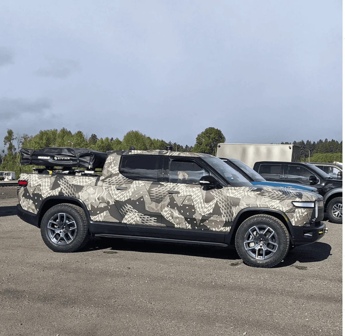 Rivian R1T R1S Rivian R1T spotted with winch and extended yellow tow hooks Screen Shot 2021-05-07 at 12.53.40 PM
