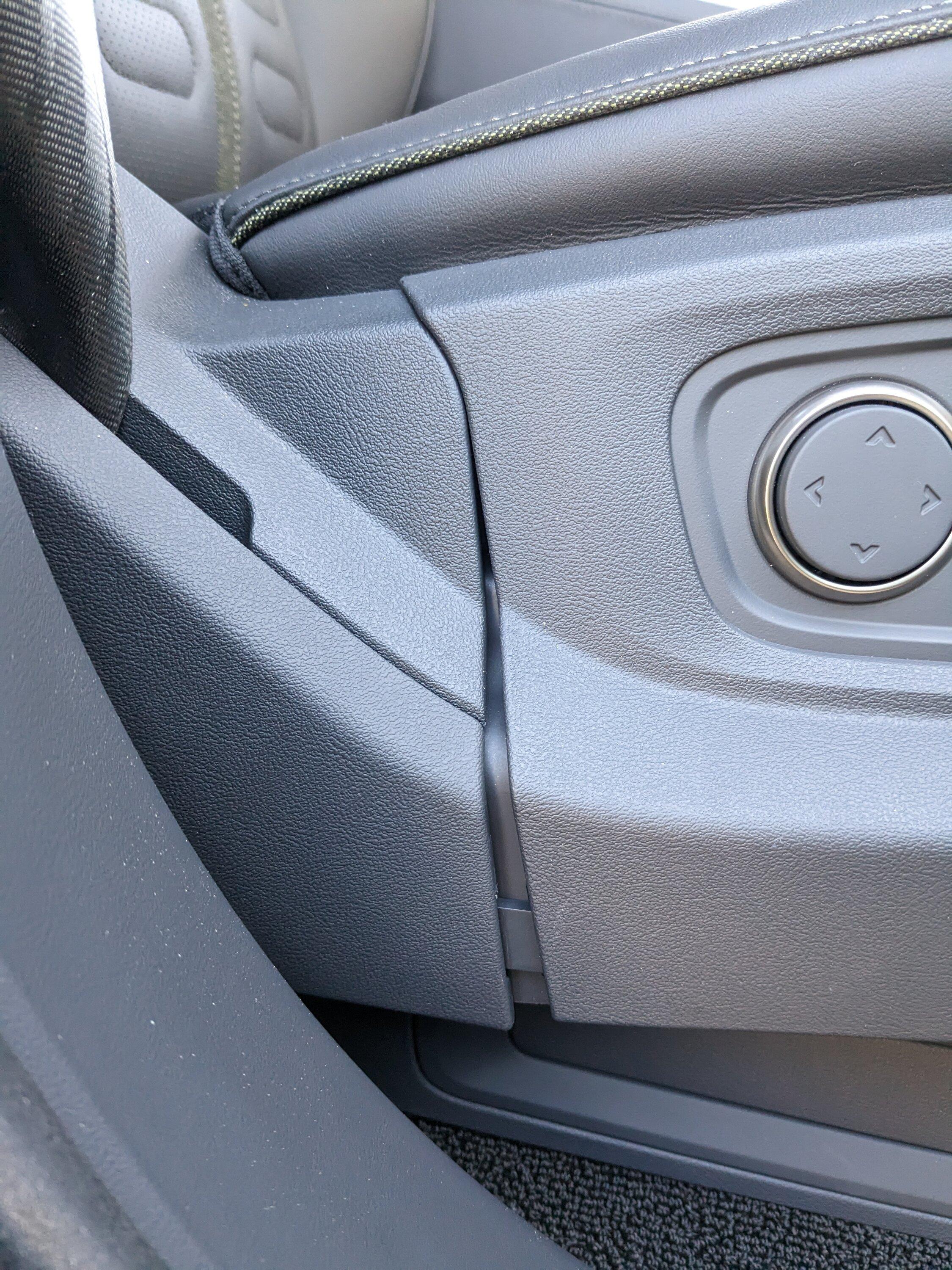 Rivian R1T R1S Plastic seat trim separating PXL_20221217_195945677
