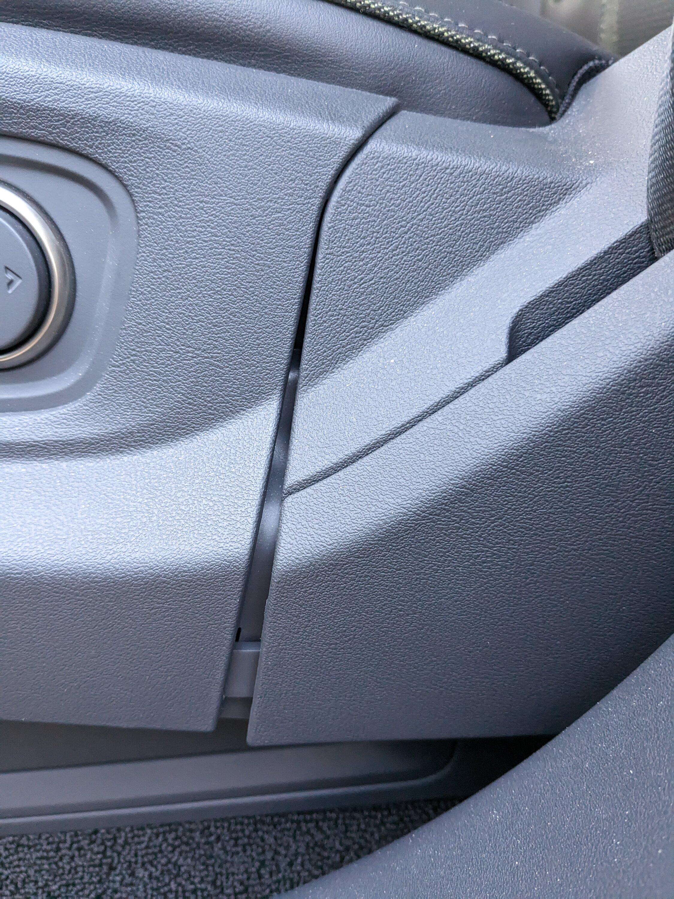 Rivian R1T R1S Plastic seat trim separating PXL_20221217_200028271