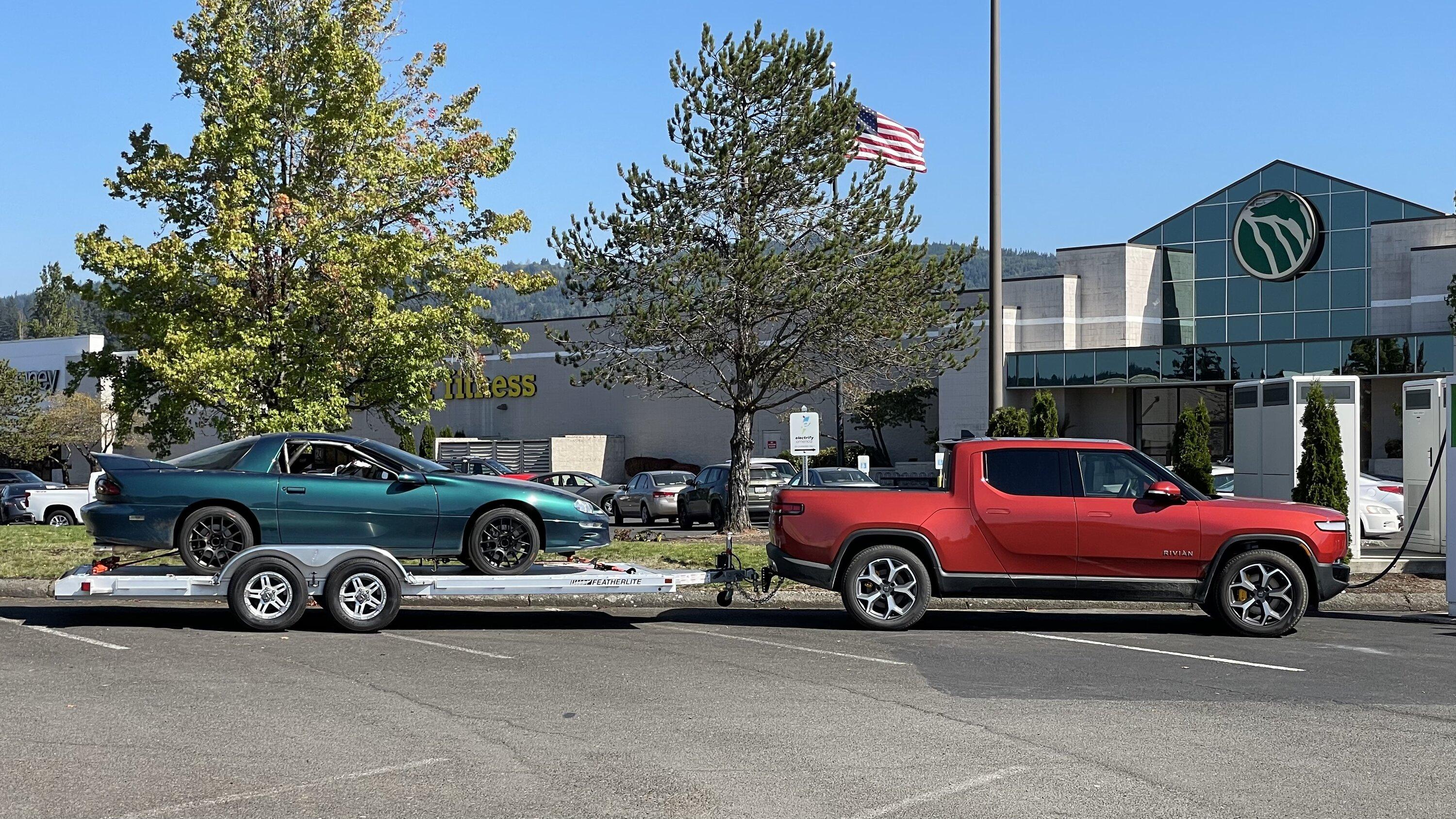 Rivian R1T R1S Towing a car trailer - approximate range hit? 56666381-EFB7-4713-BA35-5B3ECCA60CDC