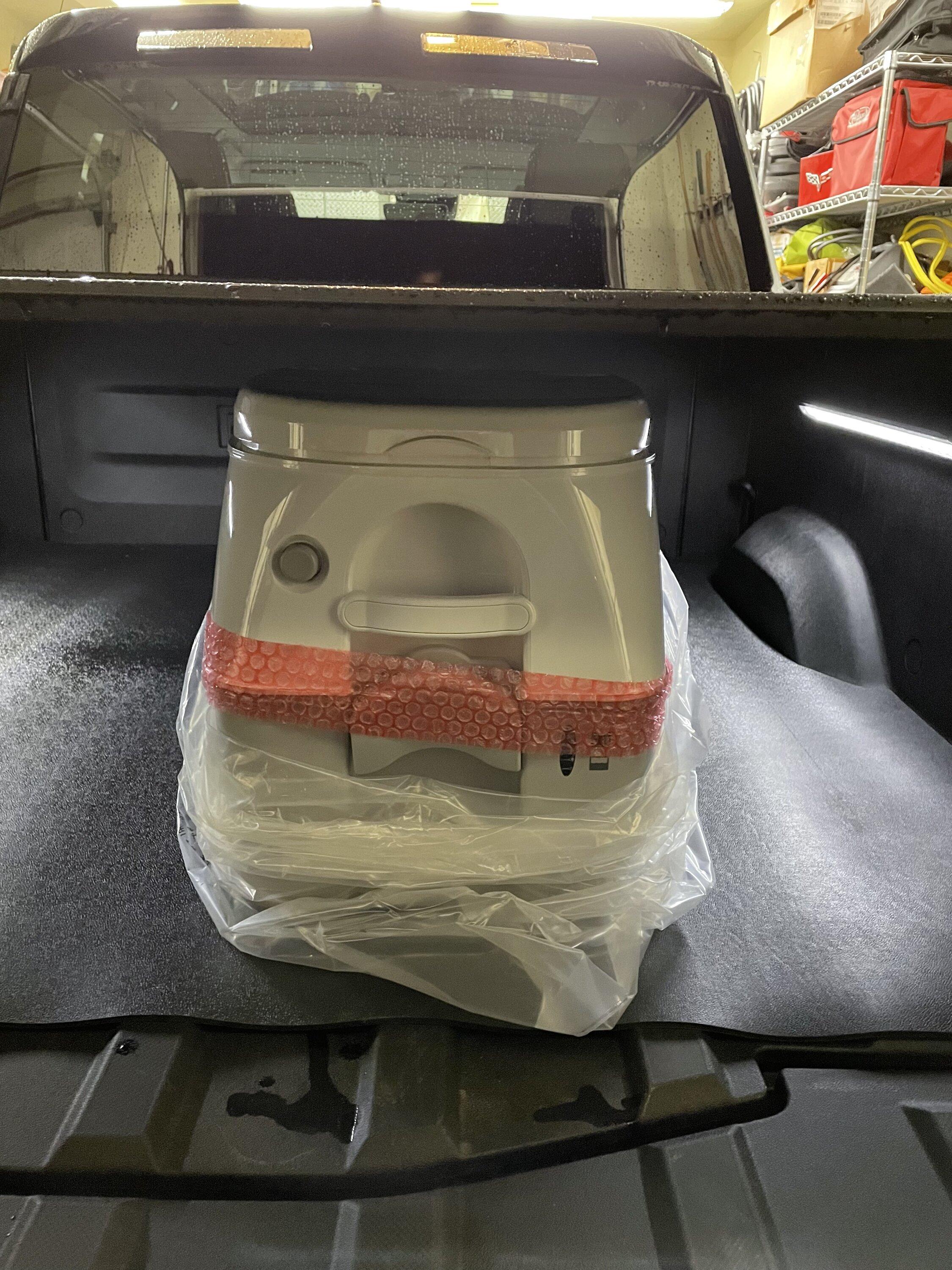 Rivian R1T R1S Portable toilet that fits under Tonneau? DAD04B78-9CAC-44B3-ABCA-6677A52A98D6