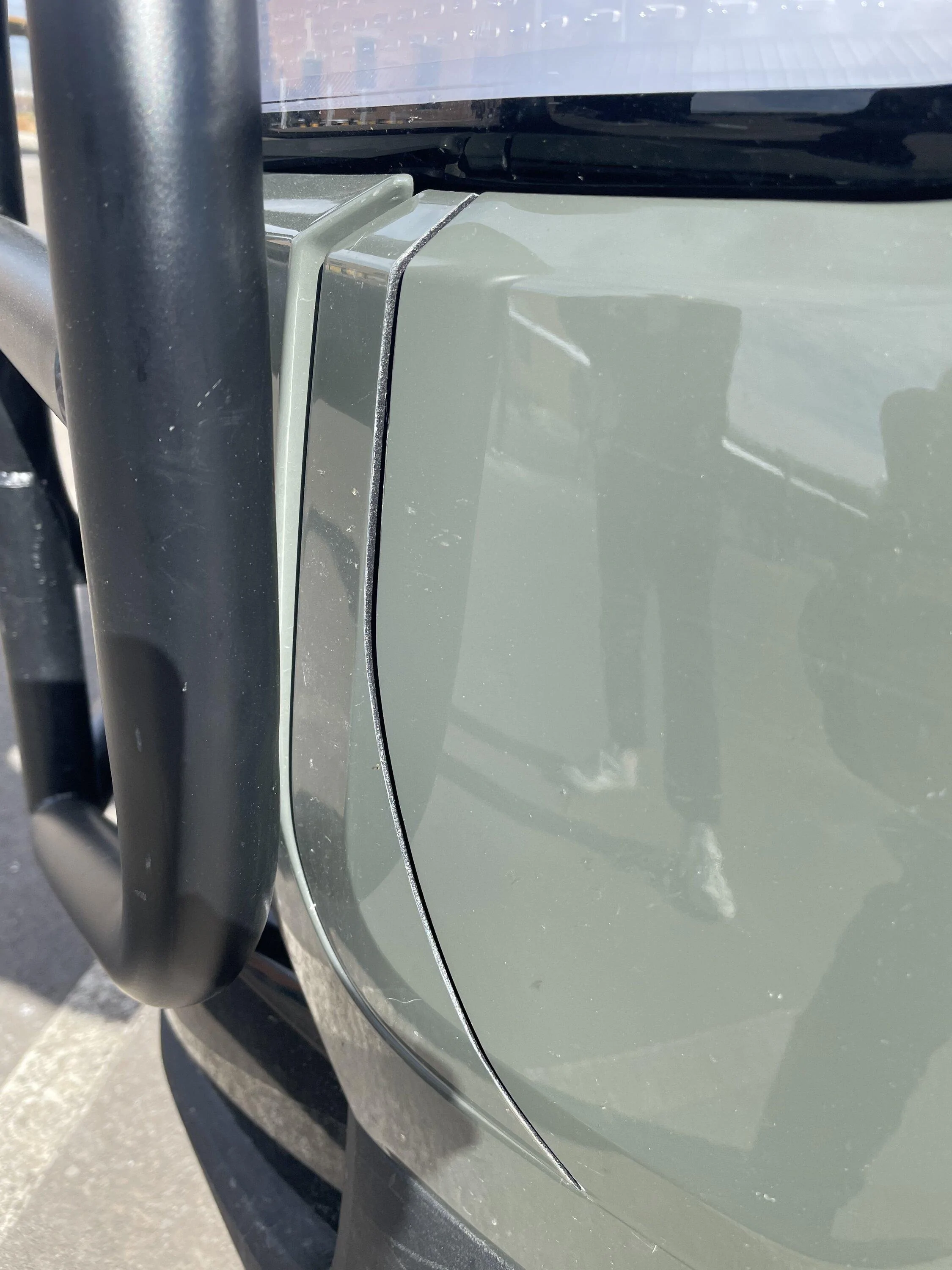 Rivian R1T R1S Brush Bars Grille on R1T spotted at Denver SC AB98CF04-D6C9-4603-9016-987BAA05D5CA