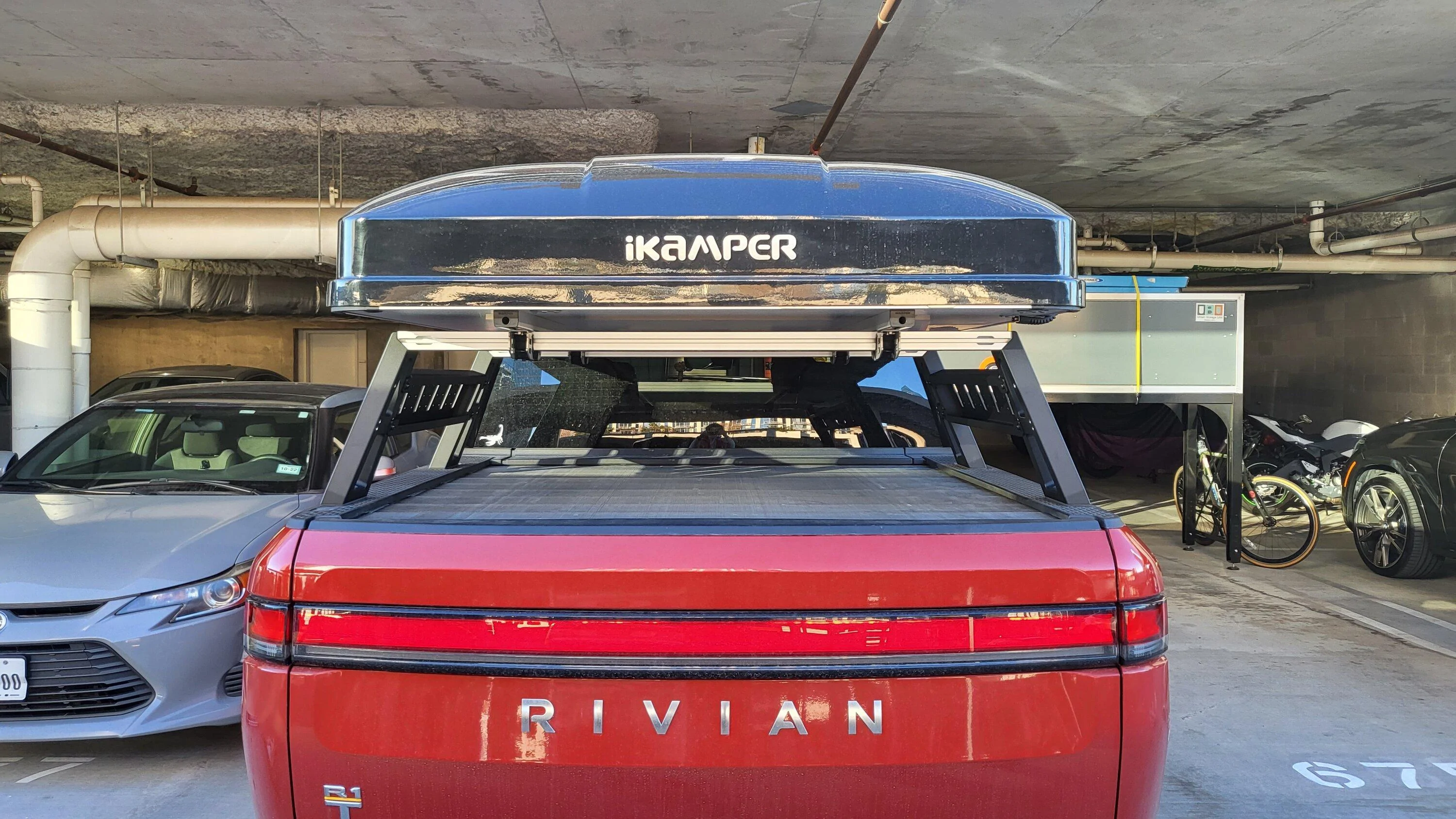 Rivian R1T R1S Range Industries Sierra Mid-rack installed w/ an iKamper Mini 3.0 mounted 20230211_171117
