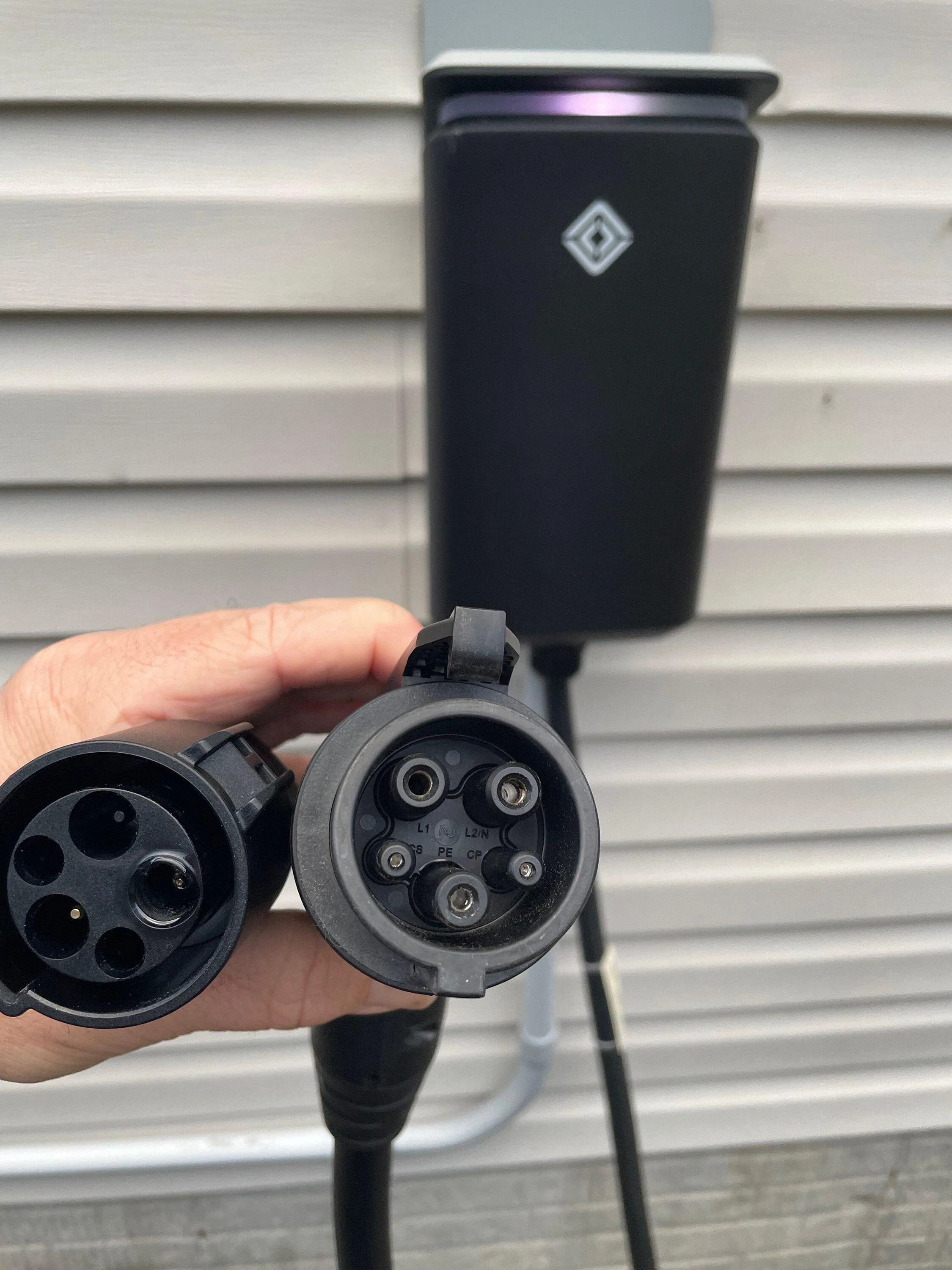 Rivian R1T R1S PSA!  Rivian doesn't recommend using a Tesla adapter with Rivian Wall Charger... it melted my pin IMG_4671