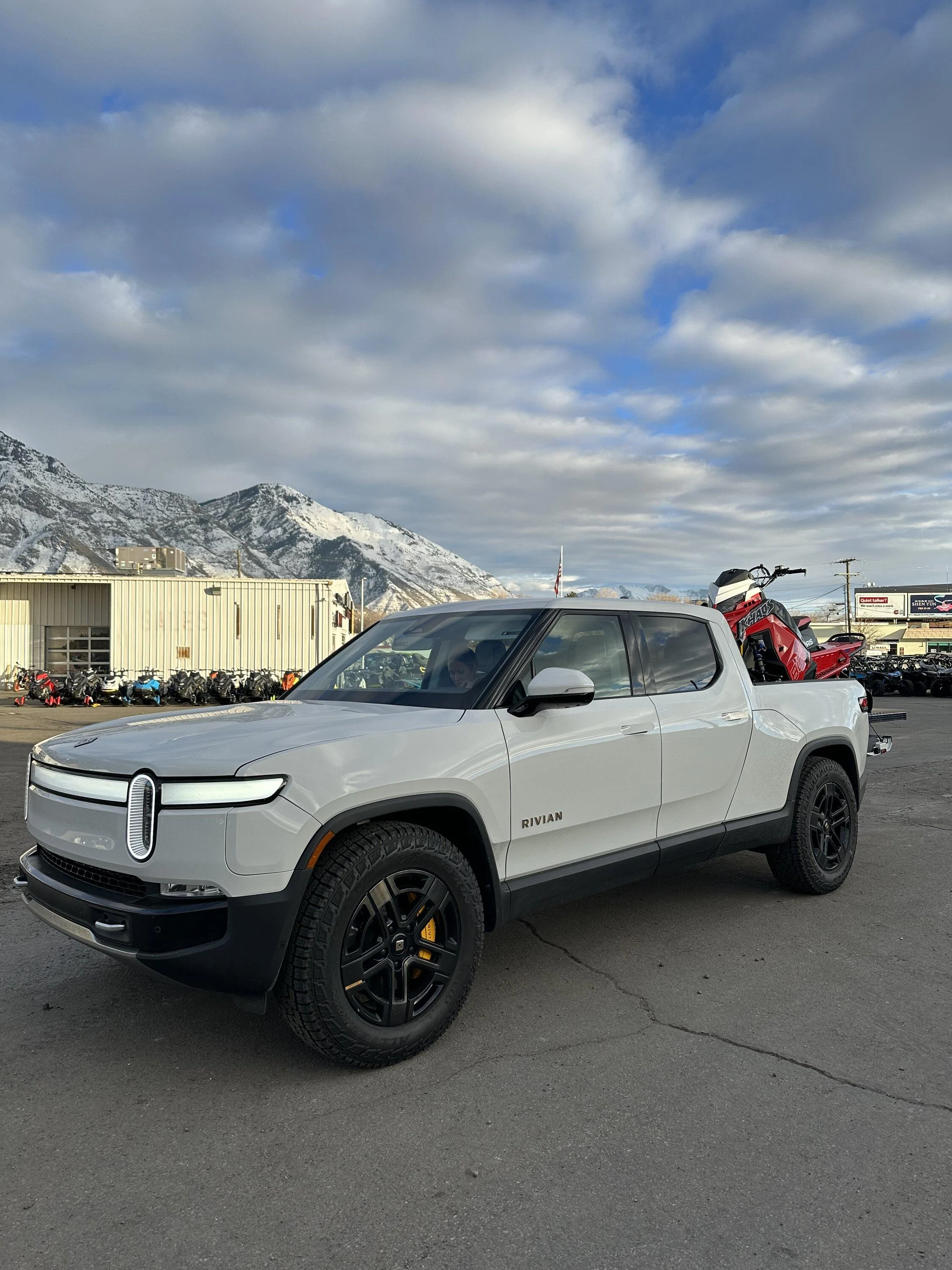 Rivian R1T R1S Snowmobile in R1T bed with deck / bed extender -- fits and performs well 5B4B5D9C-D398-478E-8E7A-FEB00A29318C
