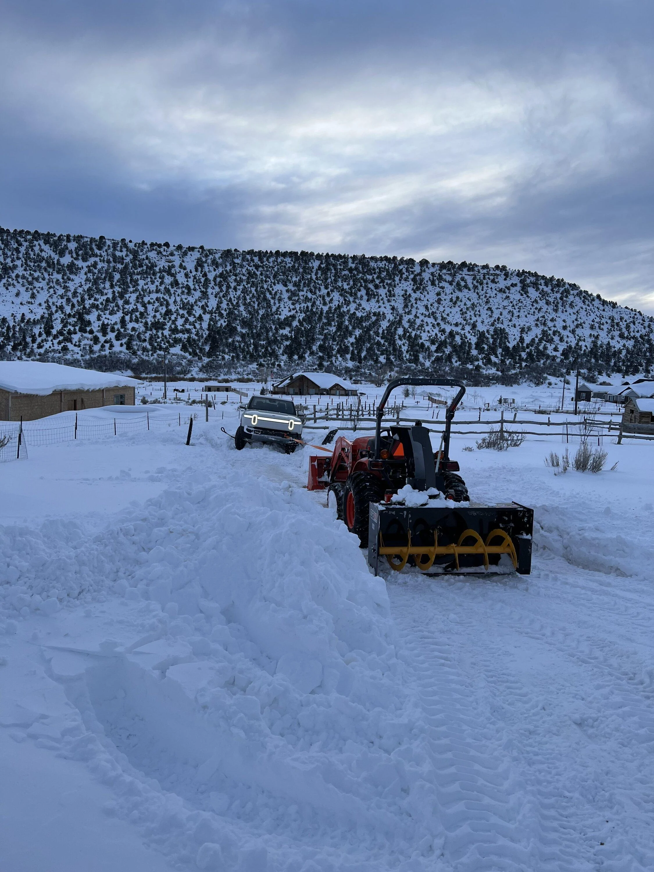 Rivian R1T R1S High centered my R1T in snow today IMG_1865