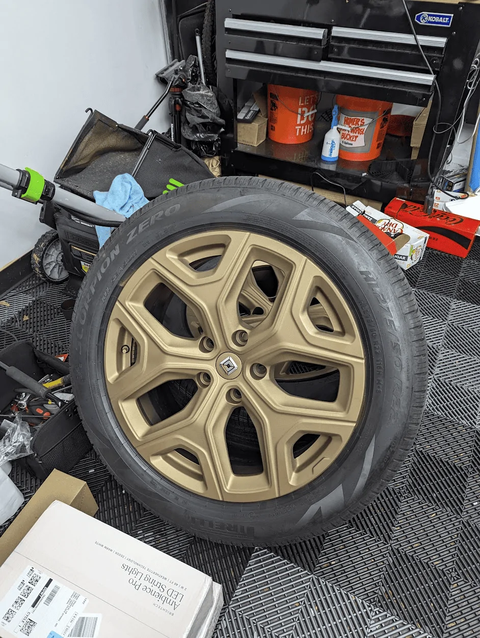 Rivian R1T R1S Plasti Dipped 21" Wheels in Brass Monkey color by HyperDip 1678334126423