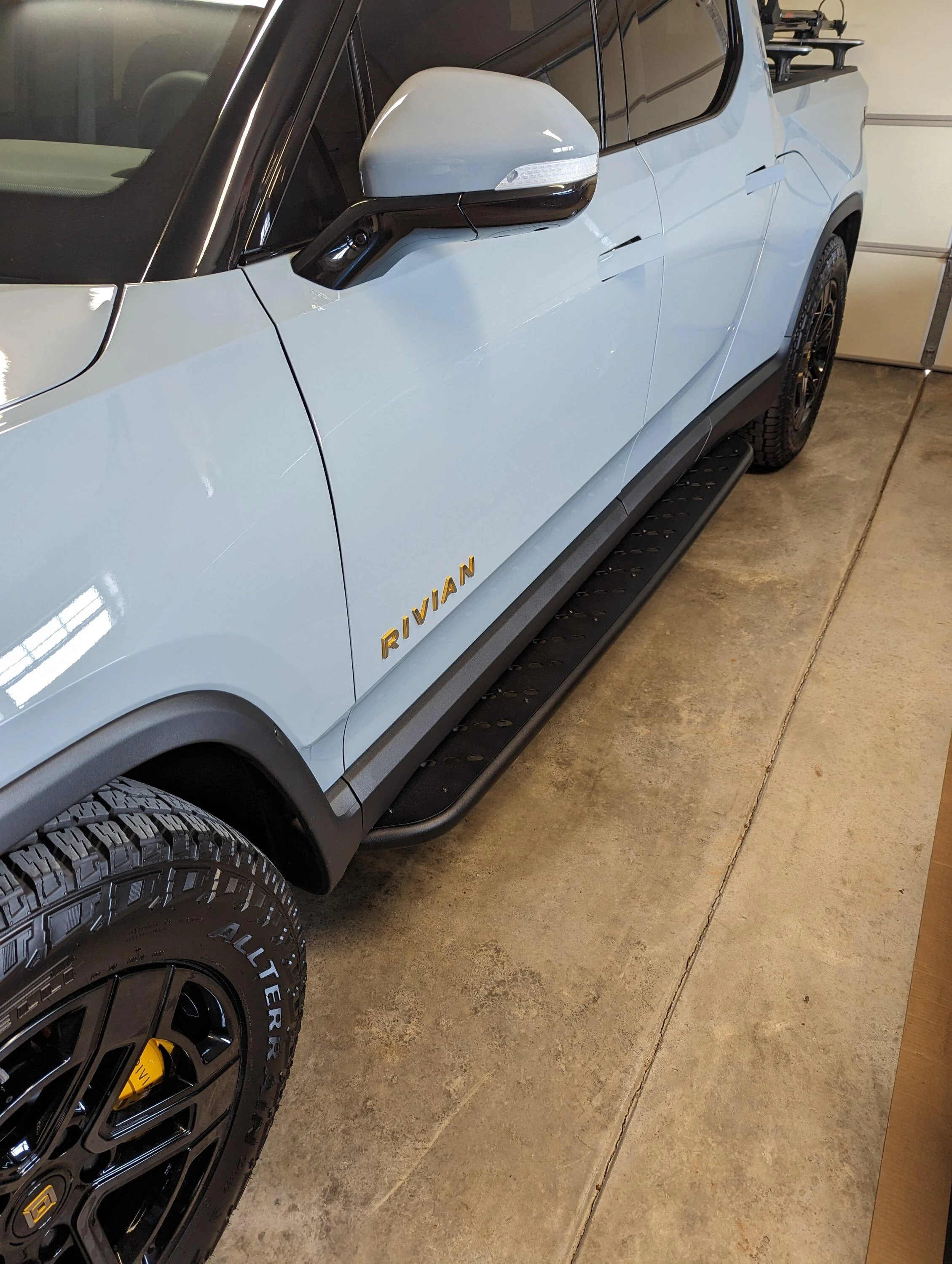 Rivian R1T R1S Introducing RMaxx Running Boards & Rock Sliders for Rivian R1T / R1S from Team 1EV PXL_20230309_182344509