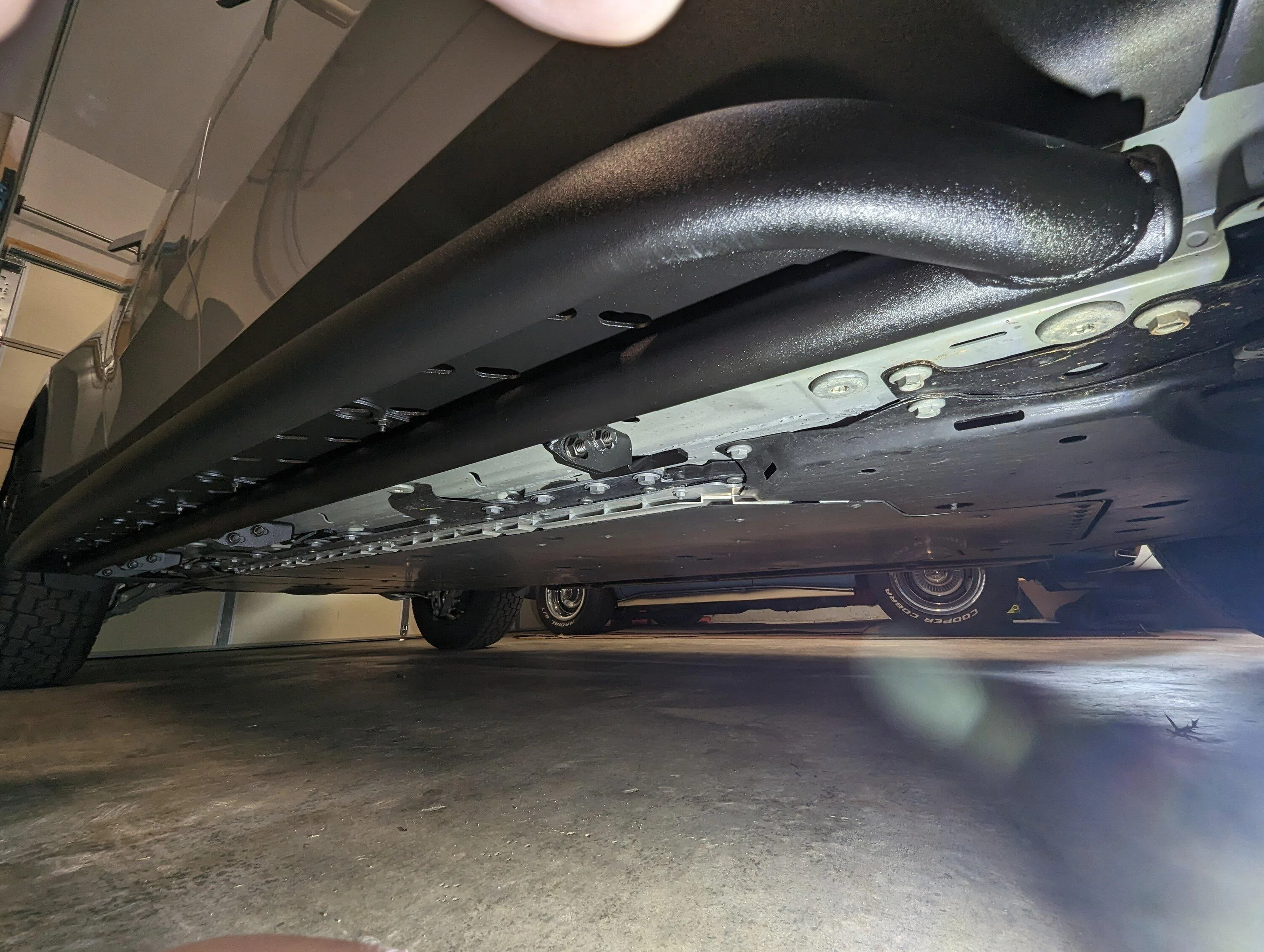 Rivian R1T R1S Introducing RMaxx Running Boards & Rock Sliders for Rivian R1T / R1S from Team 1EV PXL_20230309_182511141