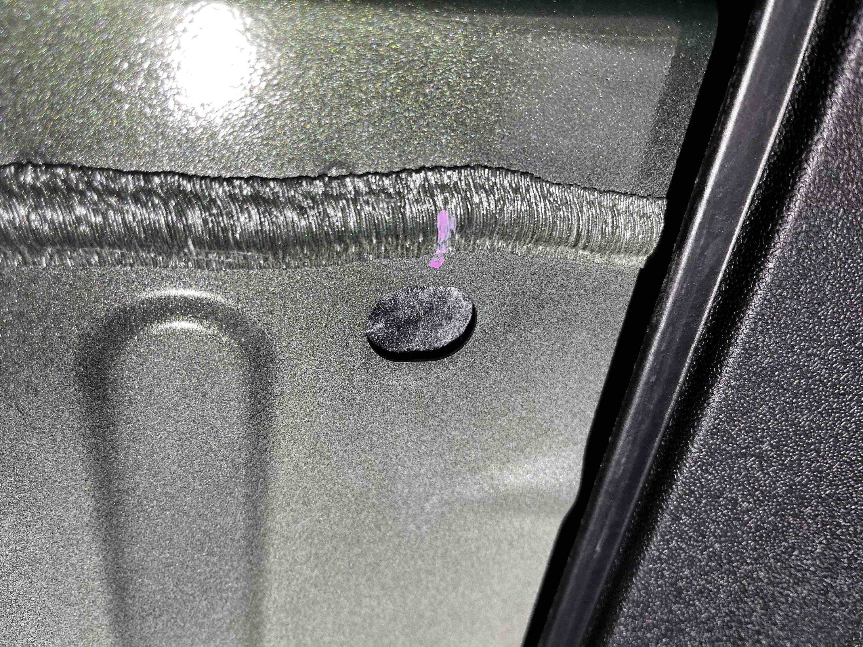 Rivian R1T R1S Reclaiming empty powered tonneau cover space 02GrommetOpen