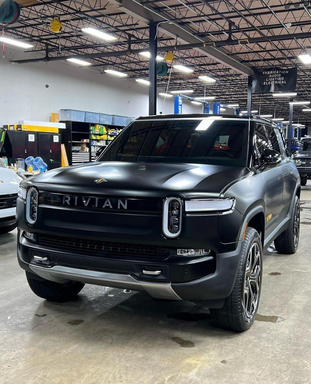Rivian R1T R1S MIDNIGHT (Black) Rivian Photos Rivian lettering light bar letters cutout vinyl wra