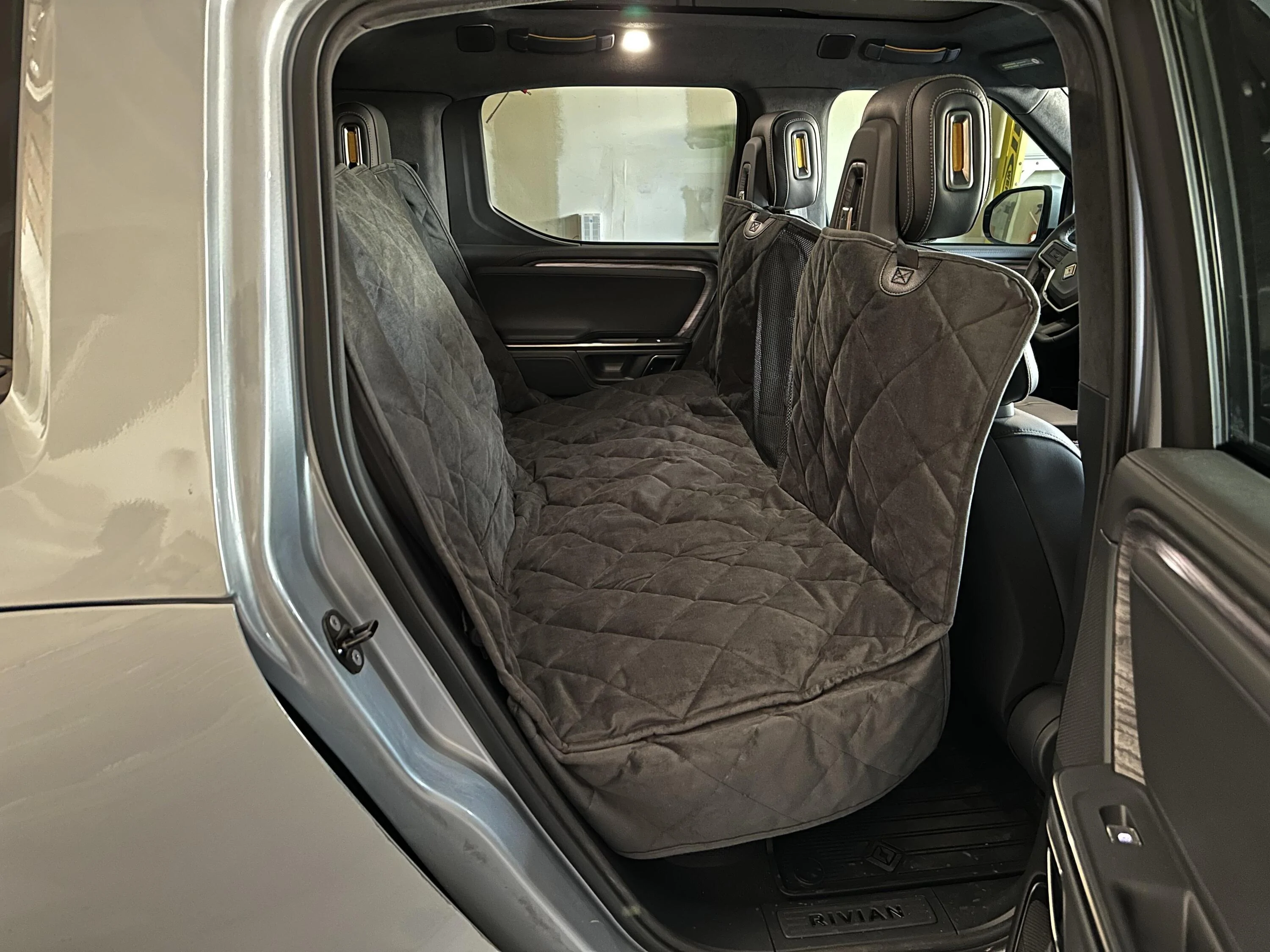Rivian R1T R1S Orvis Tough Trail Hammock Seat Protector installed fthtcuq