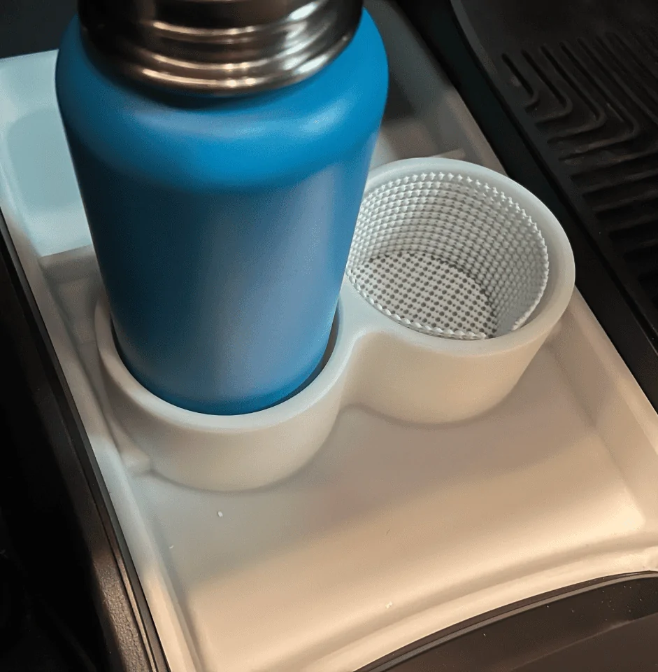 Rivian R1T R1S 【update: opinion needed】Organizer for that massive space on the lower console area. f72eef67ec5bd189a401aa81327bfb2