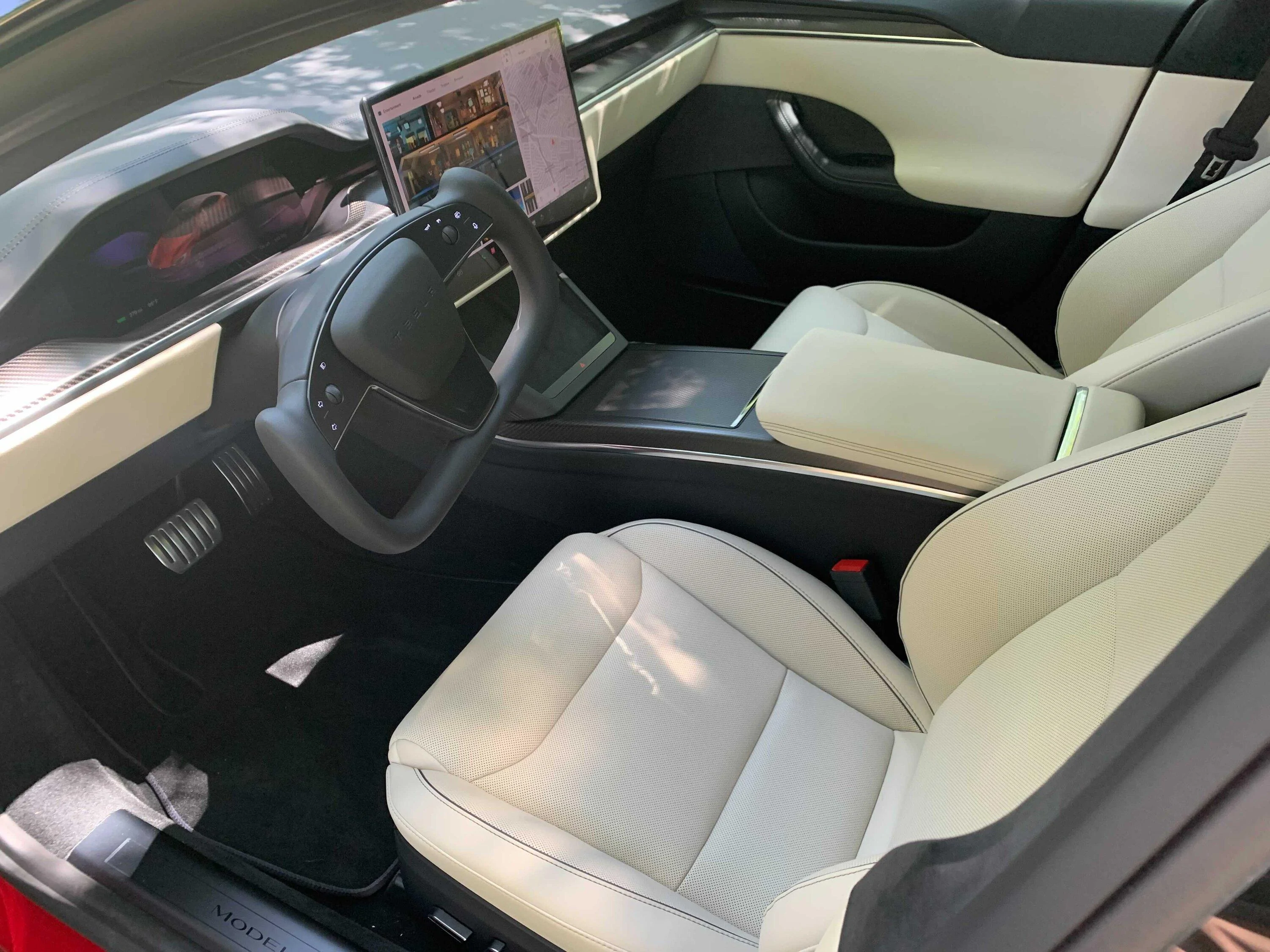 Rivian R1T R1S Trade your Rivian Blue R1S for my Red Model S Plaid? interior