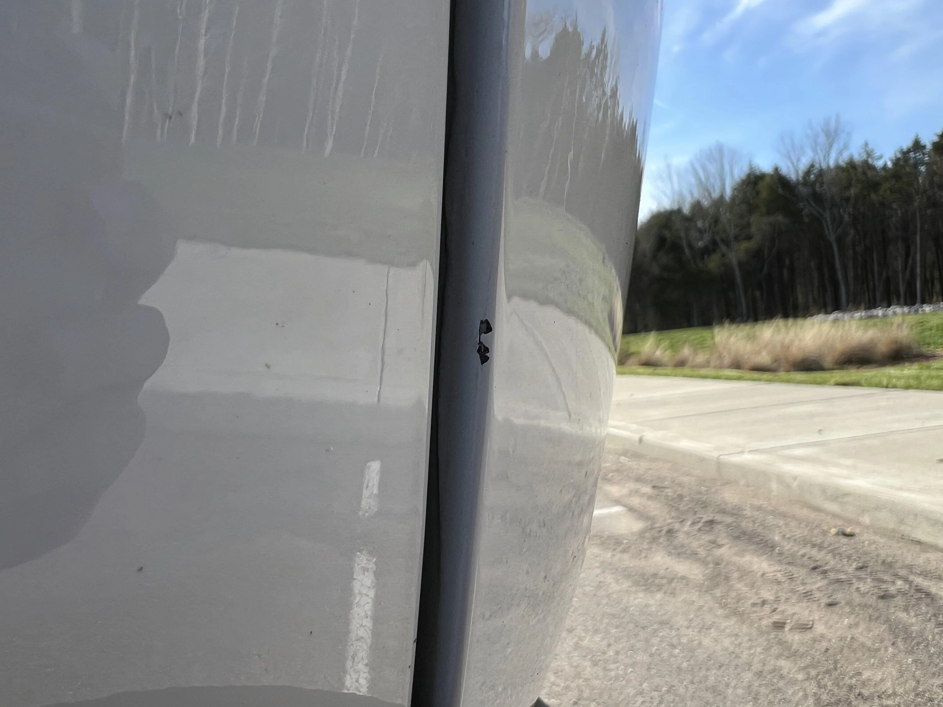 Rivian R1T R1S In what world are these types of paint issues acceptable on new R1S? IMG_4700