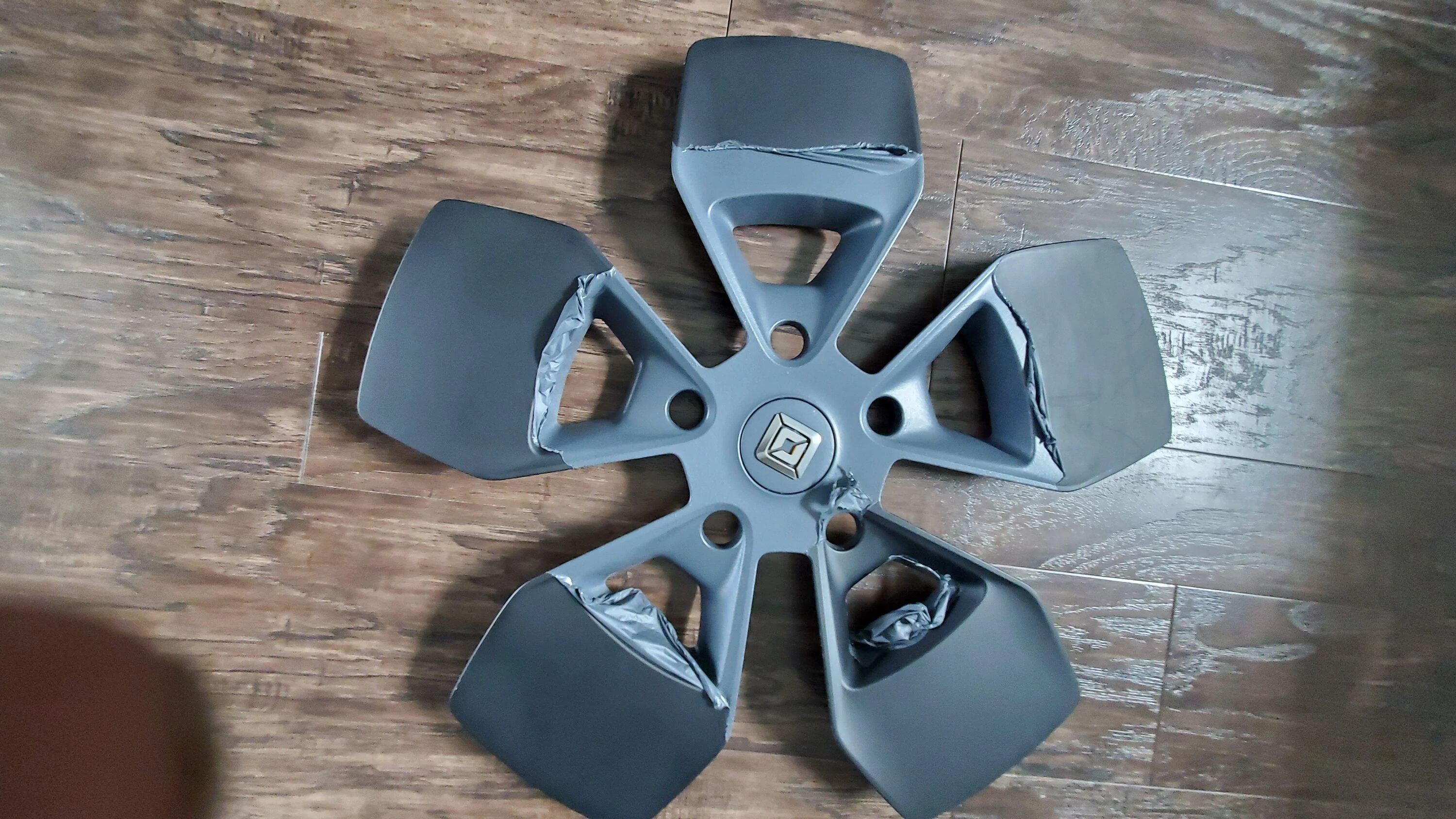 Rivian R1T R1S Spraying the 21" aero covers in Gunmetal.... 20230406_151906