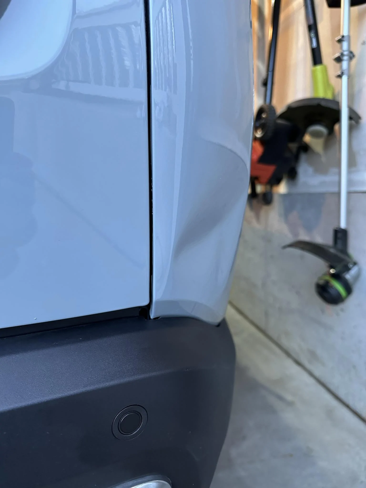Rivian R1T R1S A Master at Work - Paintless Dent Repair (PDR) MAGIC on my R1T here in Colorado! IMG_1718