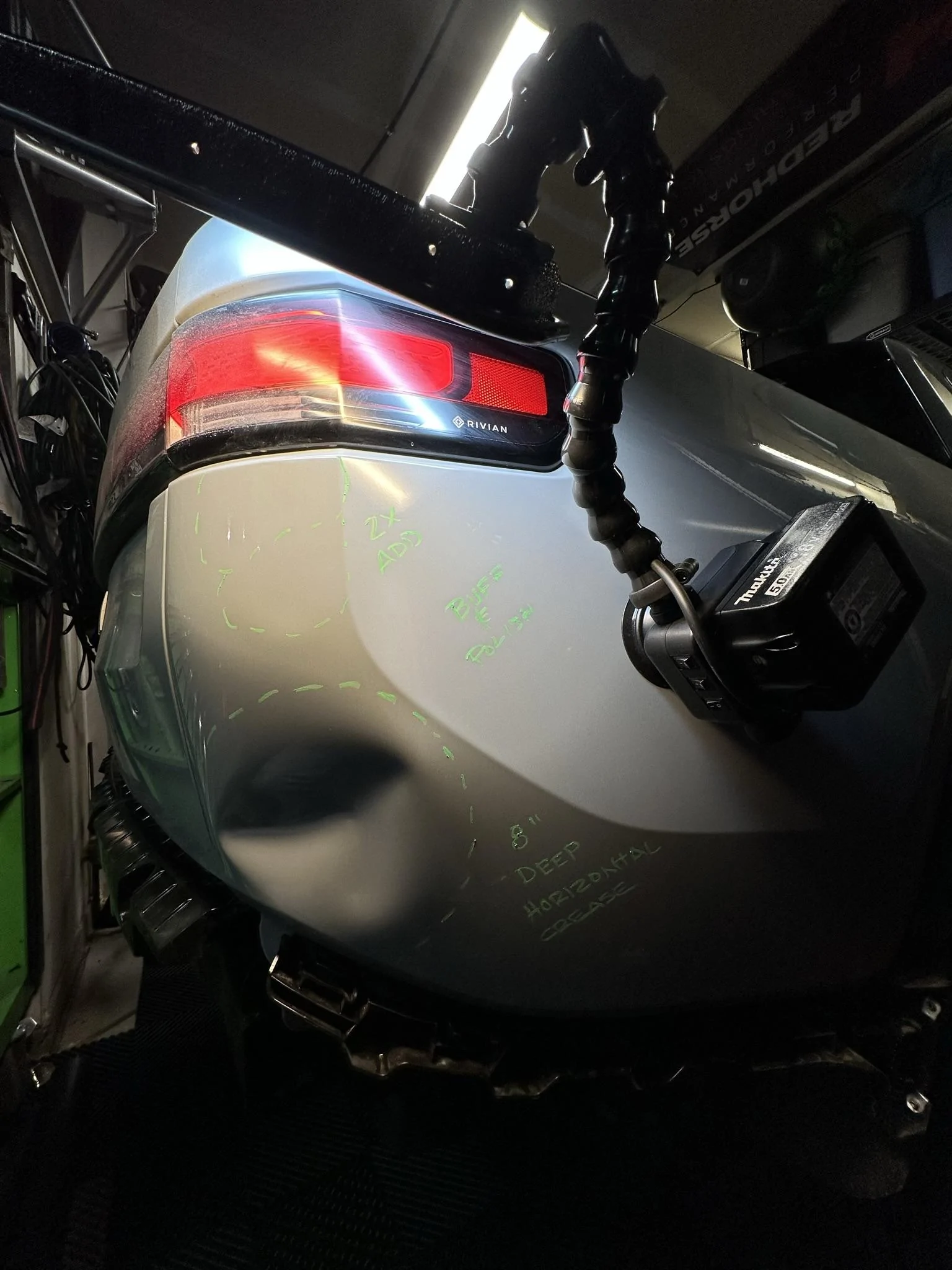 Rivian R1T R1S A Master at Work - Paintless Dent Repair (PDR) MAGIC on my R1T here in Colorado! IMG_2284