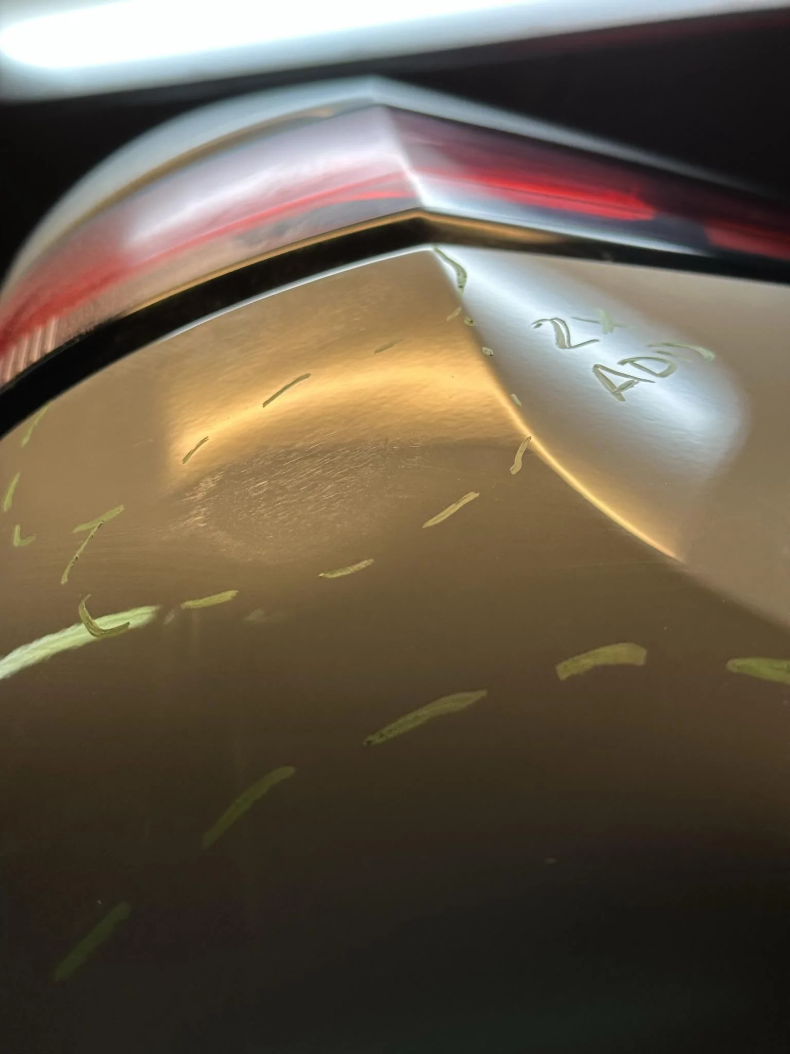 Rivian R1T R1S A Master at Work - Paintless Dent Repair (PDR) MAGIC on my R1T here in Colorado! IMG_2281