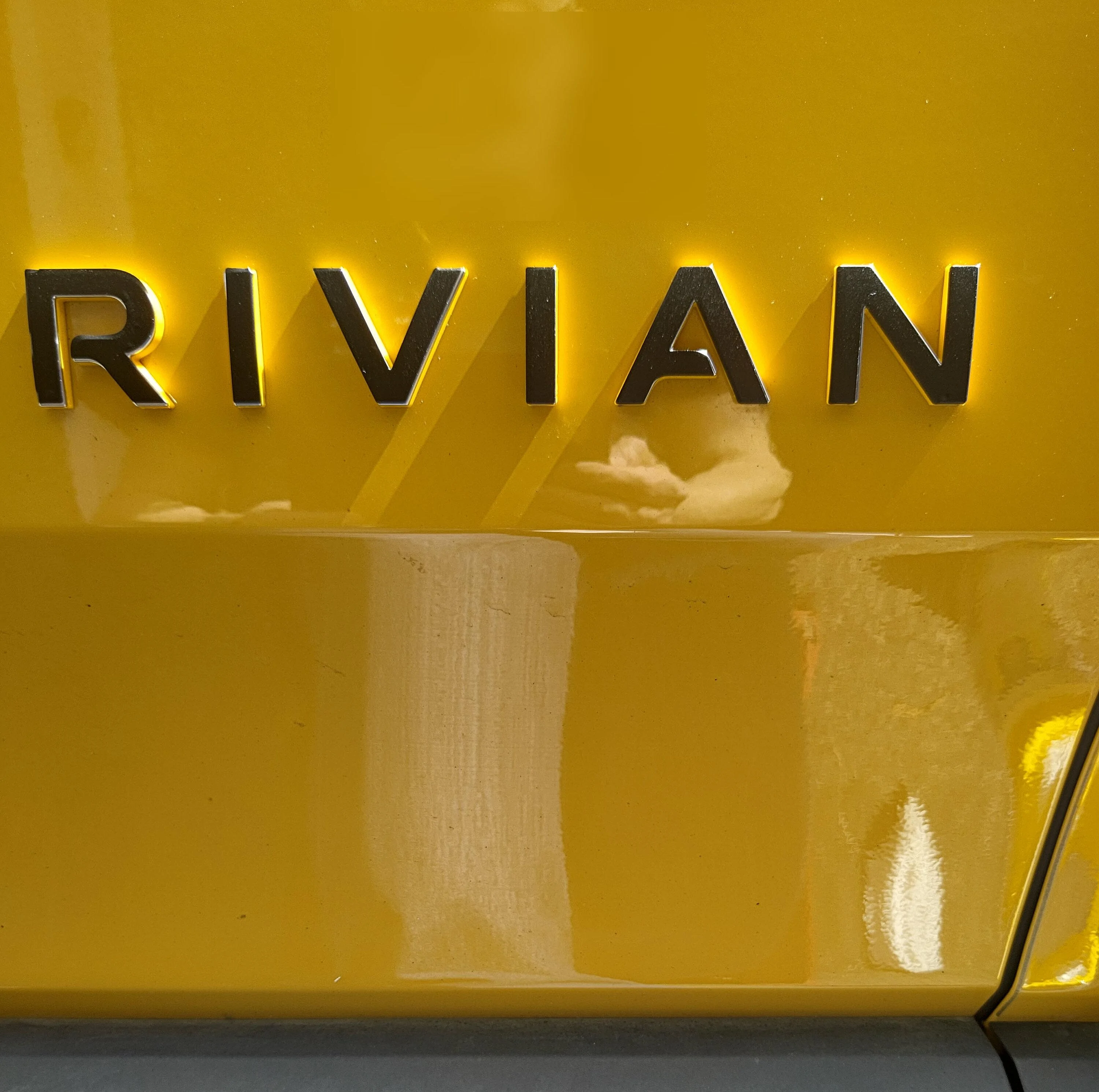 Rivian R1T R1S Blacked out my logos with vinyl crsideinblack