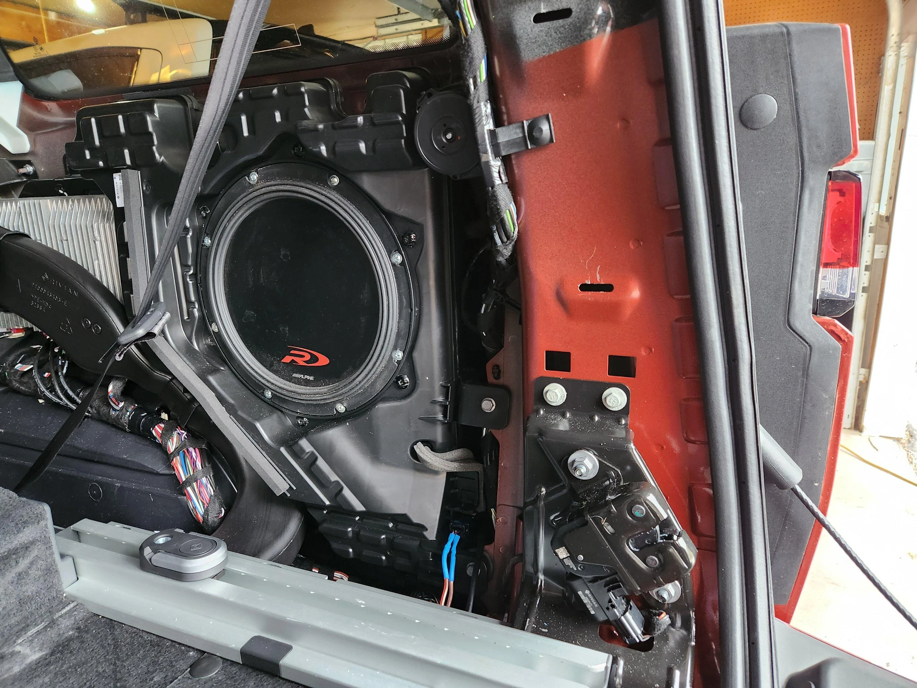 Rivian R1T R1S Upgraded the sub in R1S with aftermarket Alpine SWR-T10 Subwoofer 20230404_130516