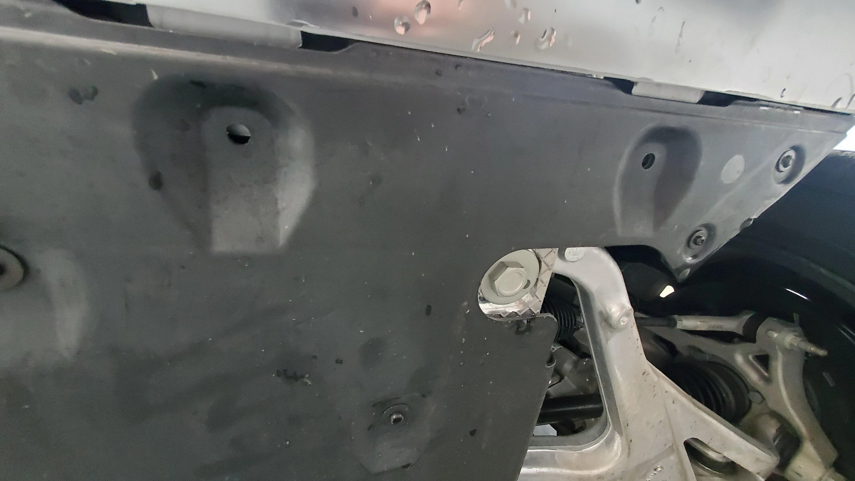 Rivian R1T R1S Am I missing 4 front skid plate bolts? 20230423_150235